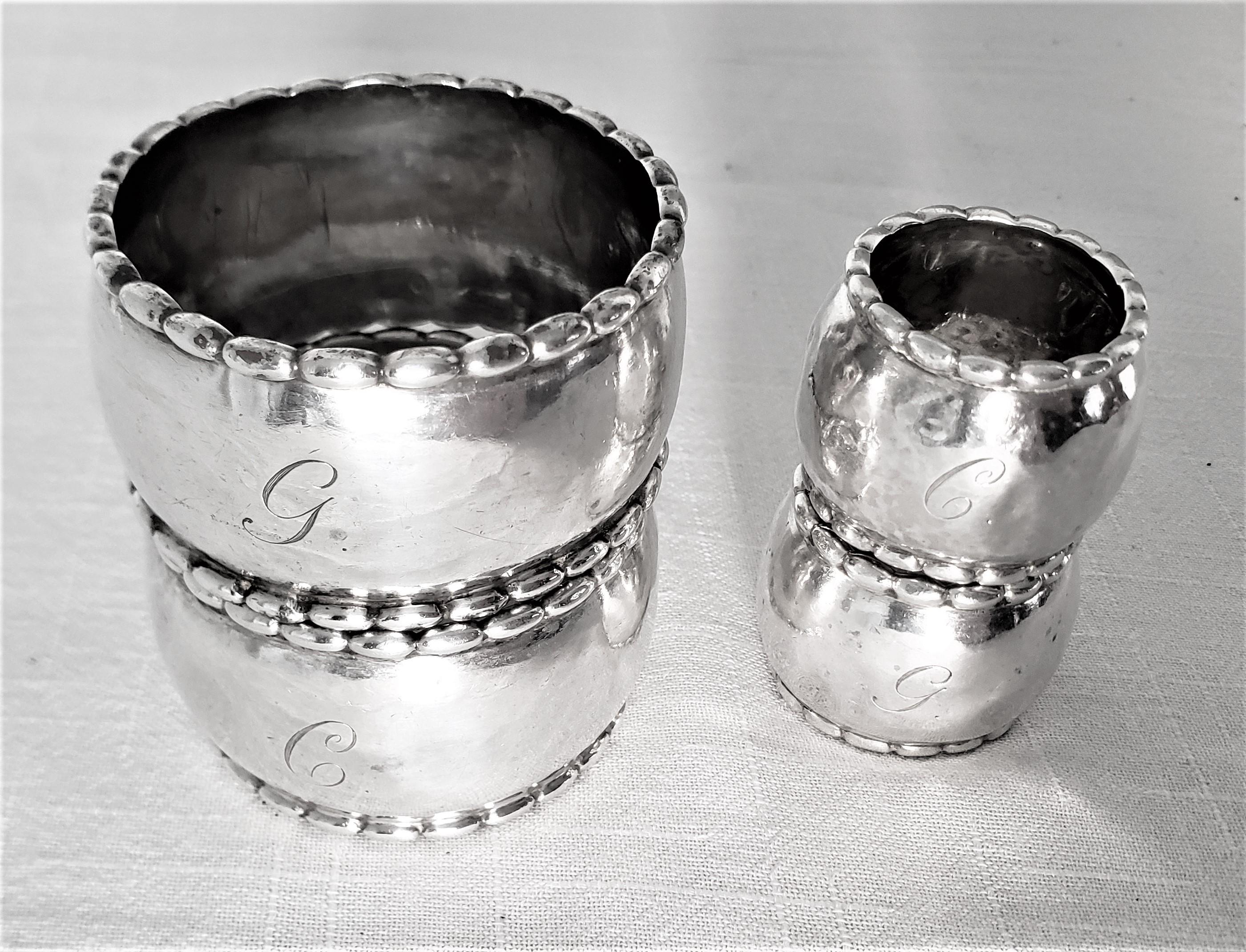 Hand-Crafted Set of 4 Georg Jensen Sterling Silver Hand Hammered Napkin Rings For Sale