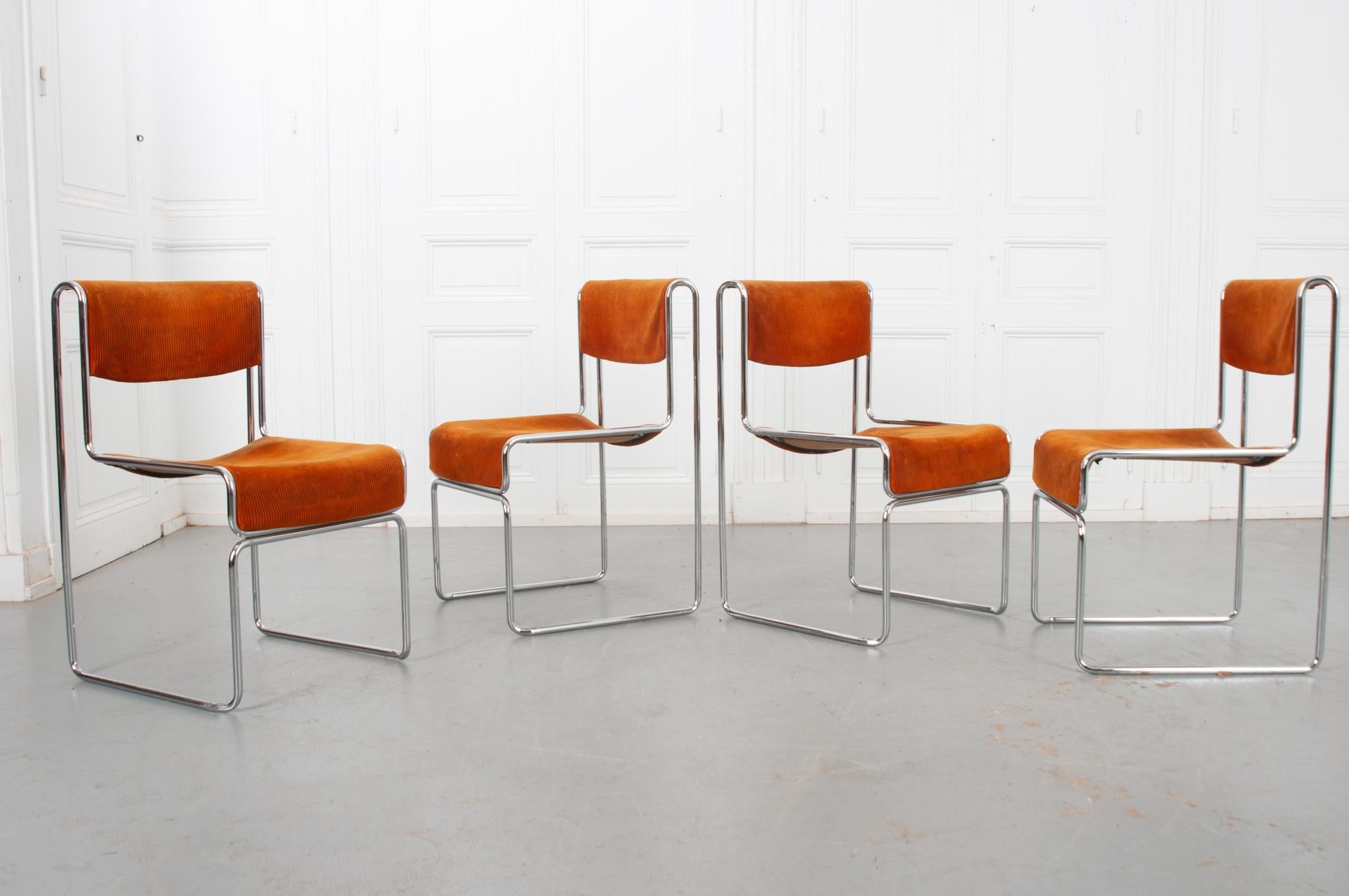 Bring your dining experience into the 20th Century with this outstanding set of 4 German chrome and upholstered dining chairs. The chairs have a tubular, chrome-plated frame, which has been bent into their iconic cube form. Their minimalist style