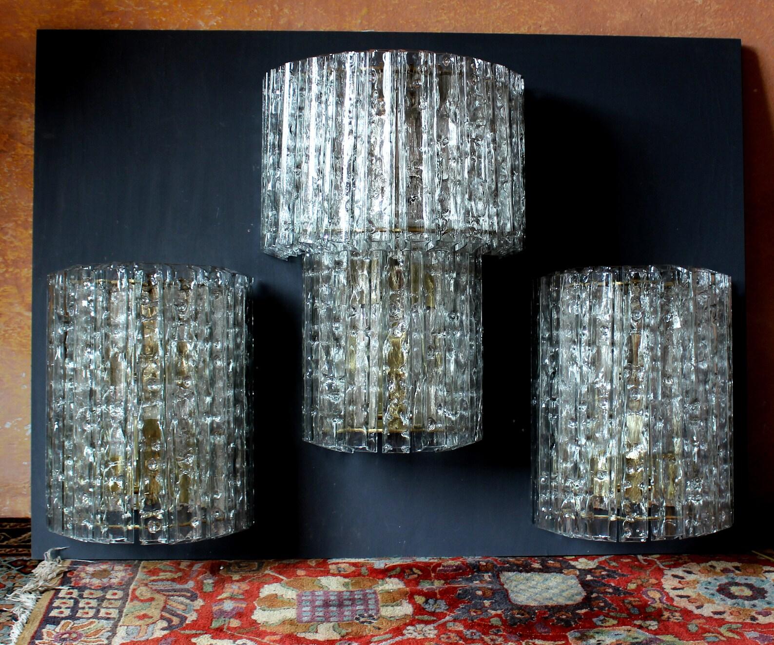 SET OF 4 FANTASTIC DORIA FÜRTH GIGANTIC CRYSTAL GLASS SCONCES

2x SIMPLE 5 LIGHTS (E27) & 10 GRAND HAND-MADE TUBES WITH SPIDER WEBS INSIDE

14 x 18 x 8 INCHES, EACH 25 lbs

2x DOUBLE 8 LIGHTS (E27) & 23 TUBES

18 x 26 x 10 INCHES, EACH 40