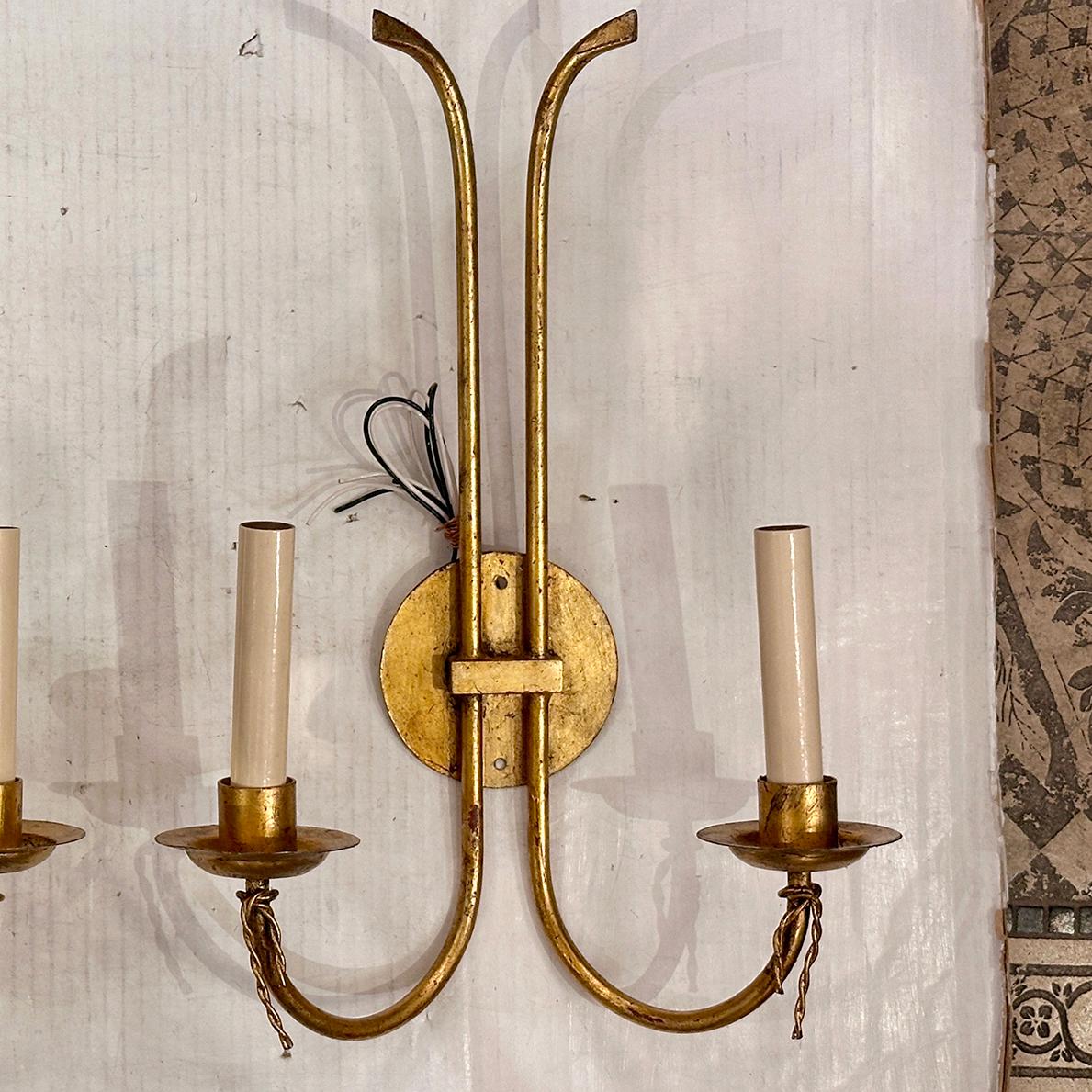 French Set of 4 Gilt Iron Sconces, Sold per Pair. For Sale