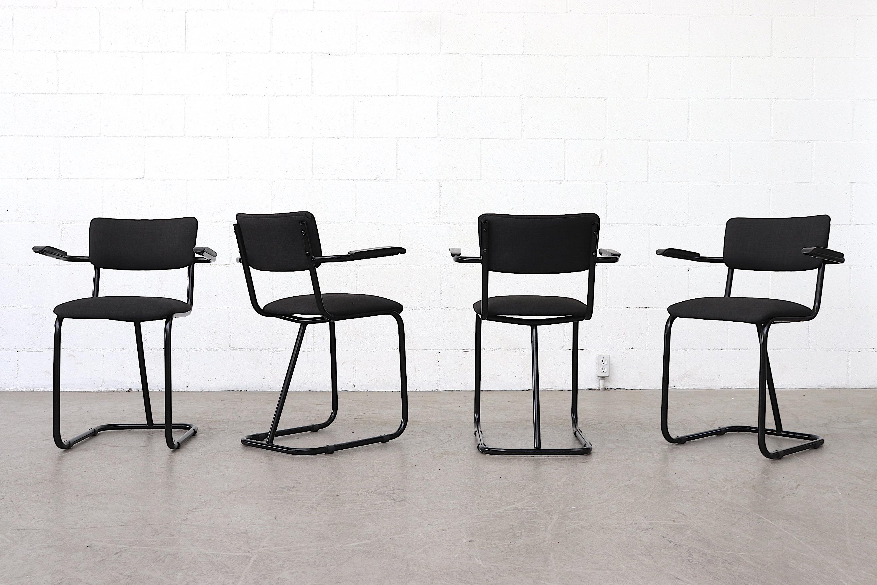 Mid-century, Fana Metaal produced chairs with upholstered tubular metal frames featuring a standout center support pole and acrylic armrests. The frames are in good condition with some age appropriate signs of wear. Set Price.