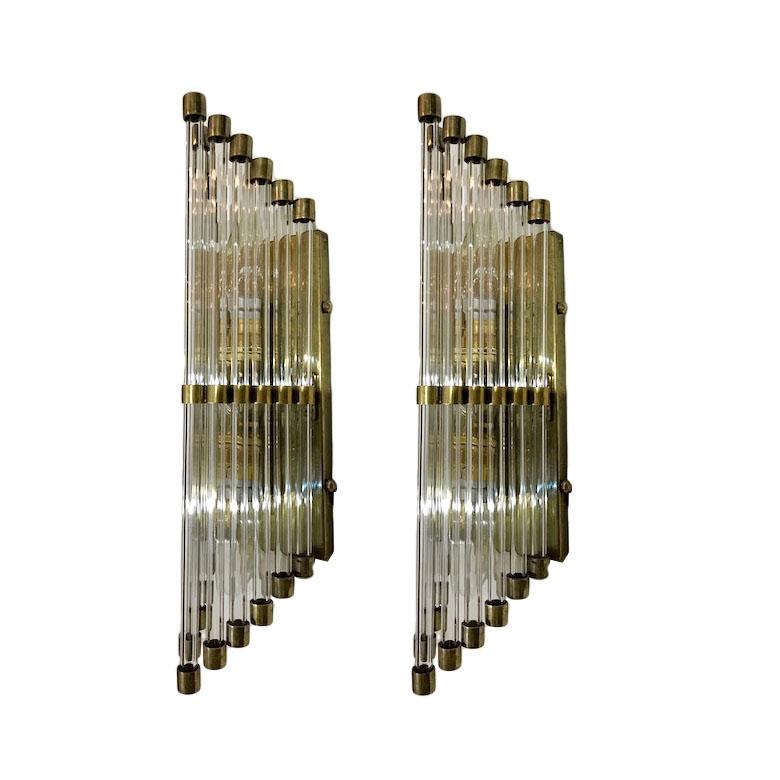 A set of 4 circa 1950's French Art Deco style Sconces with glass rods. Sold per pair.

Measurements:
Height: 16
