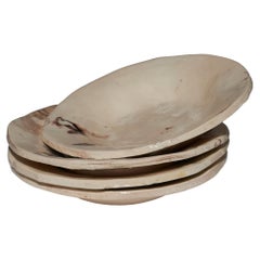 Set of 4 glazed ceramic deep plates