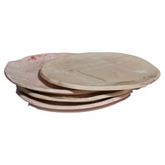 Ensemble de 4 assiettes à dessert en céramique émaillée.