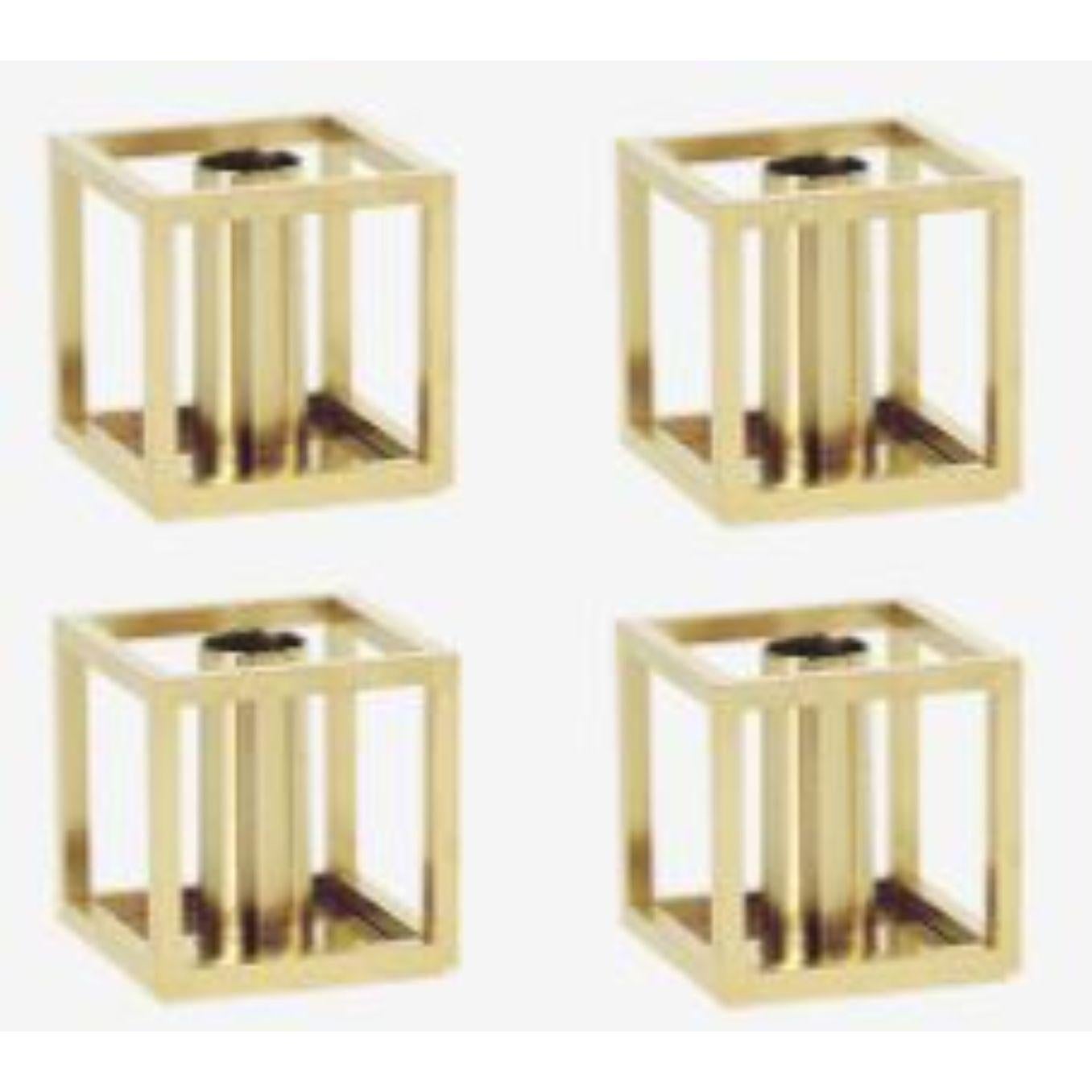 Set of 4 gold plated kubus 1 candle holders by Lassen
Dimensions: D 7 x W 7 x H 7 cm 
Materials: Metal 
Also available in different dimensions.
Weight: 0.40 kg

A new small wonder has seen the light of day. Kubus Micro is a stylish, smaller