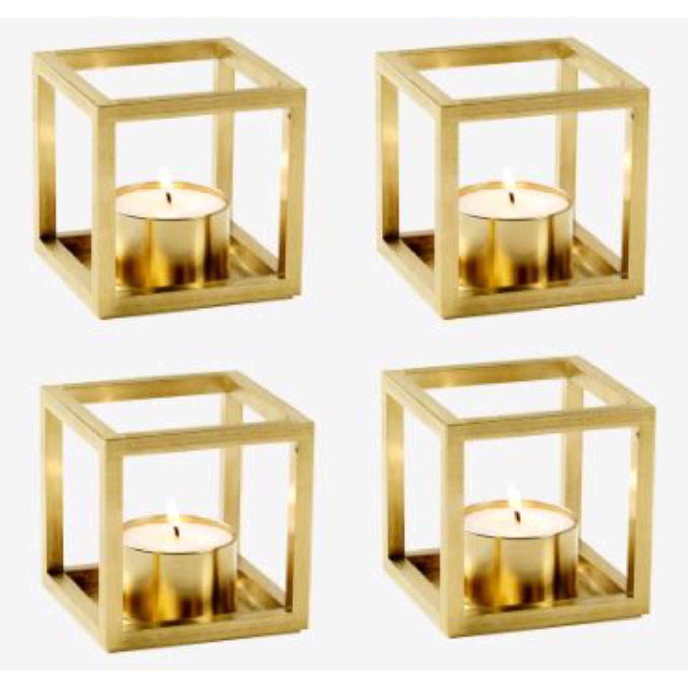 Set of 4 gold plated Kubus T candle holders by Lassen
Dimensions: D 7 x W 7 x H 7 cm 
Materials: Metal 
Also available in different dimensions and colors. 
Weight: 0.40 Kg

The tealight, Kubus T, is added to the Kubus collection in 2018,