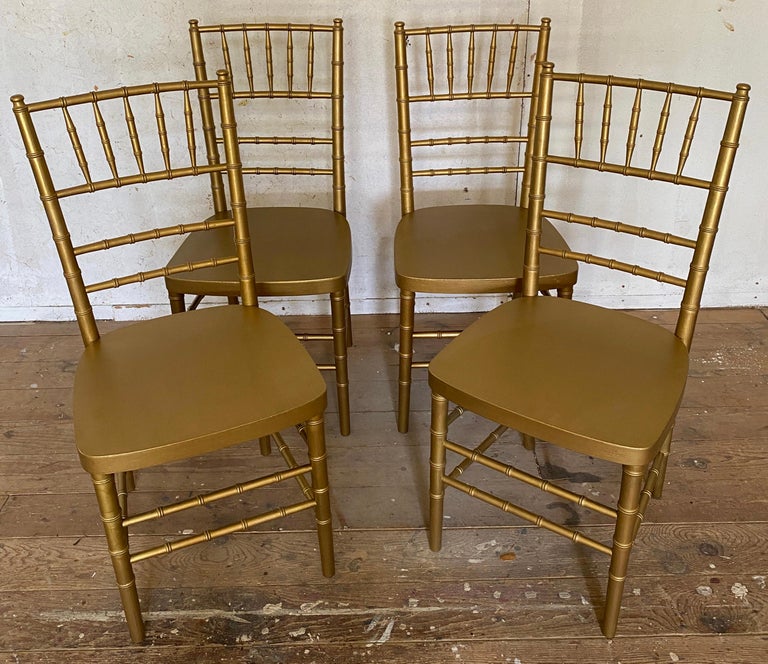 A 1900s French re-creation of a classic design, these faux-bamboo chairs have been adapted and adopted by designers and furniture makers since the 1700s. This set of four re-interprets the archetype of ‘the East, carved wood faux bamboo-form chairs