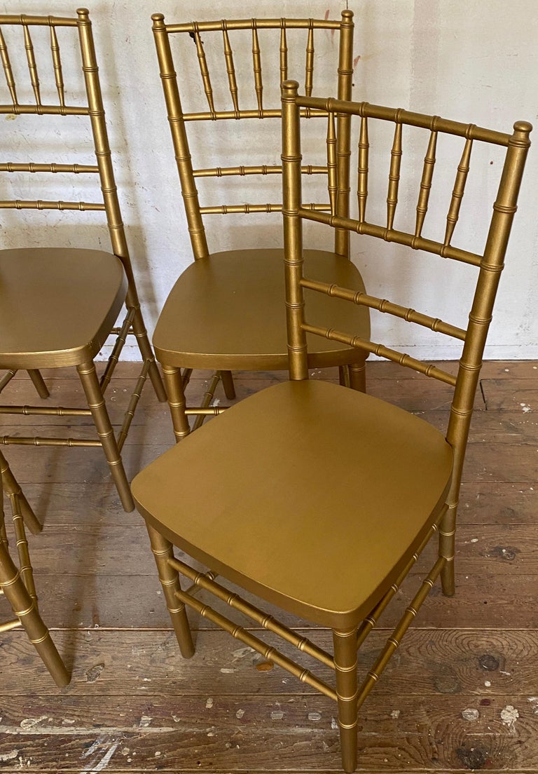 Hollywood Regency Set of 4 Gold Toned Faux Bamboo Side Dining Chairs For Sale
