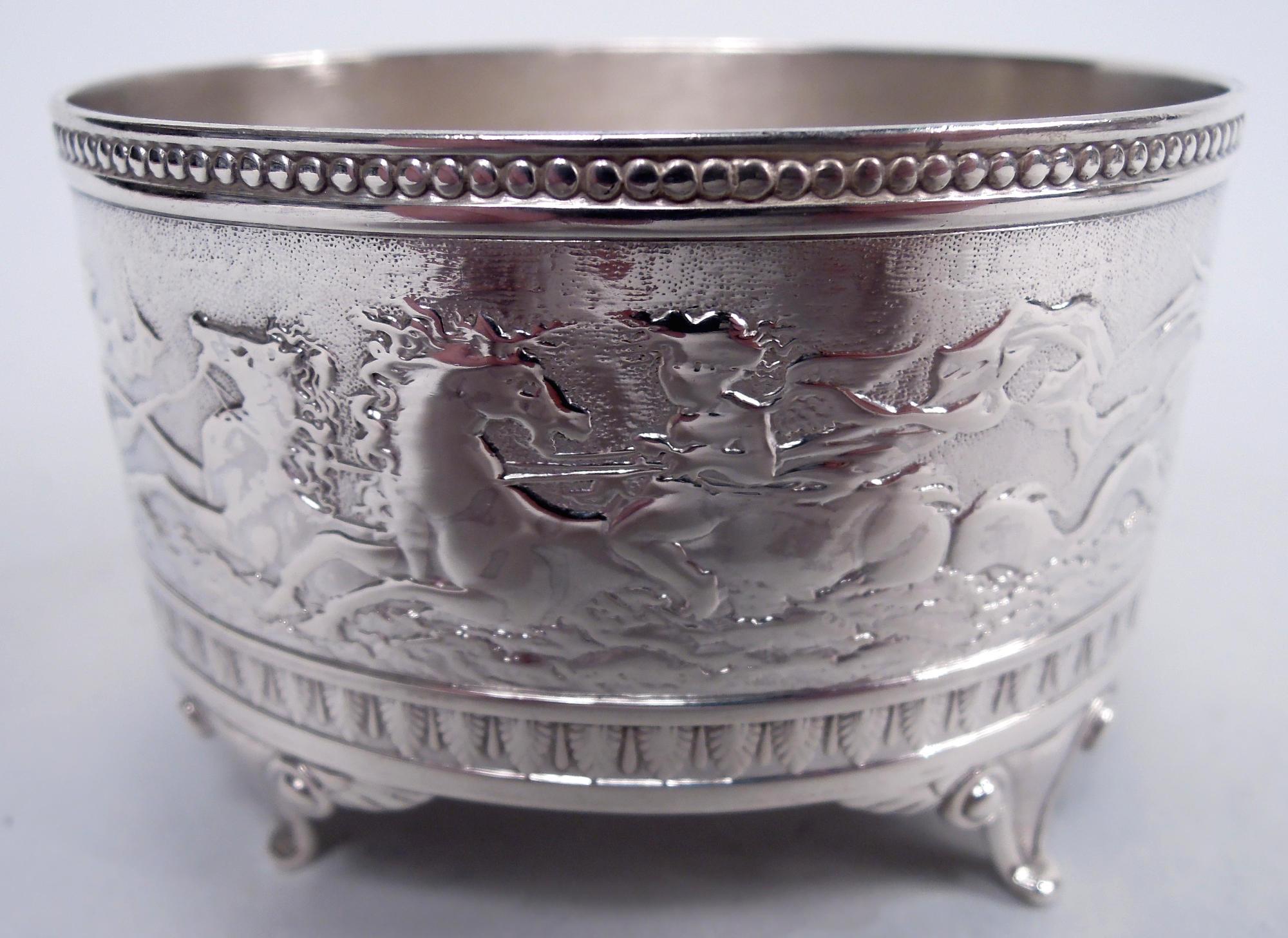 Set of 4 Aurora sterling silver open salts. Made by Gorham in Providence, 1873-74. Each: Each oval with straight sides; four leafing-scroll supports. Cast frieze depicting galloping horses and chubby cherubs; stippled ground and beaded and