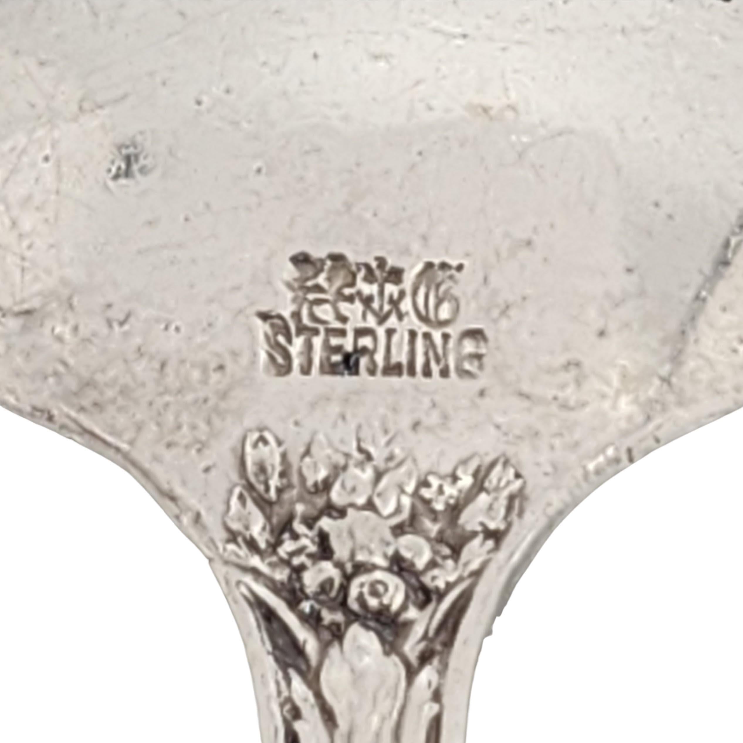 Set of 4 sterling silver round bowl soup bouillon spoons by Gorham in the Versailles pattern with a monogram.

Monogram appears to be AML, on the back of the handle.

Gorham's Versailles is a multi motif pattern designed by Antoine Heller in 1885.