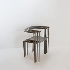Set of 4 gray metal chairs in the style of Starck's "Von Vogelsans" model