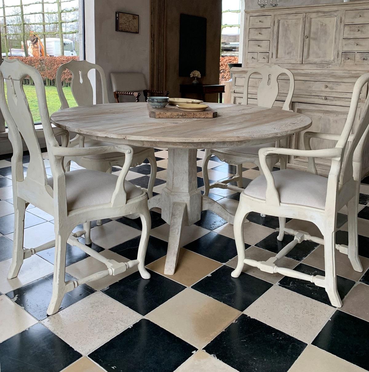 A set of newly made Gustavian style armchairs. Handcrafted, patined and upholstered with linnen.