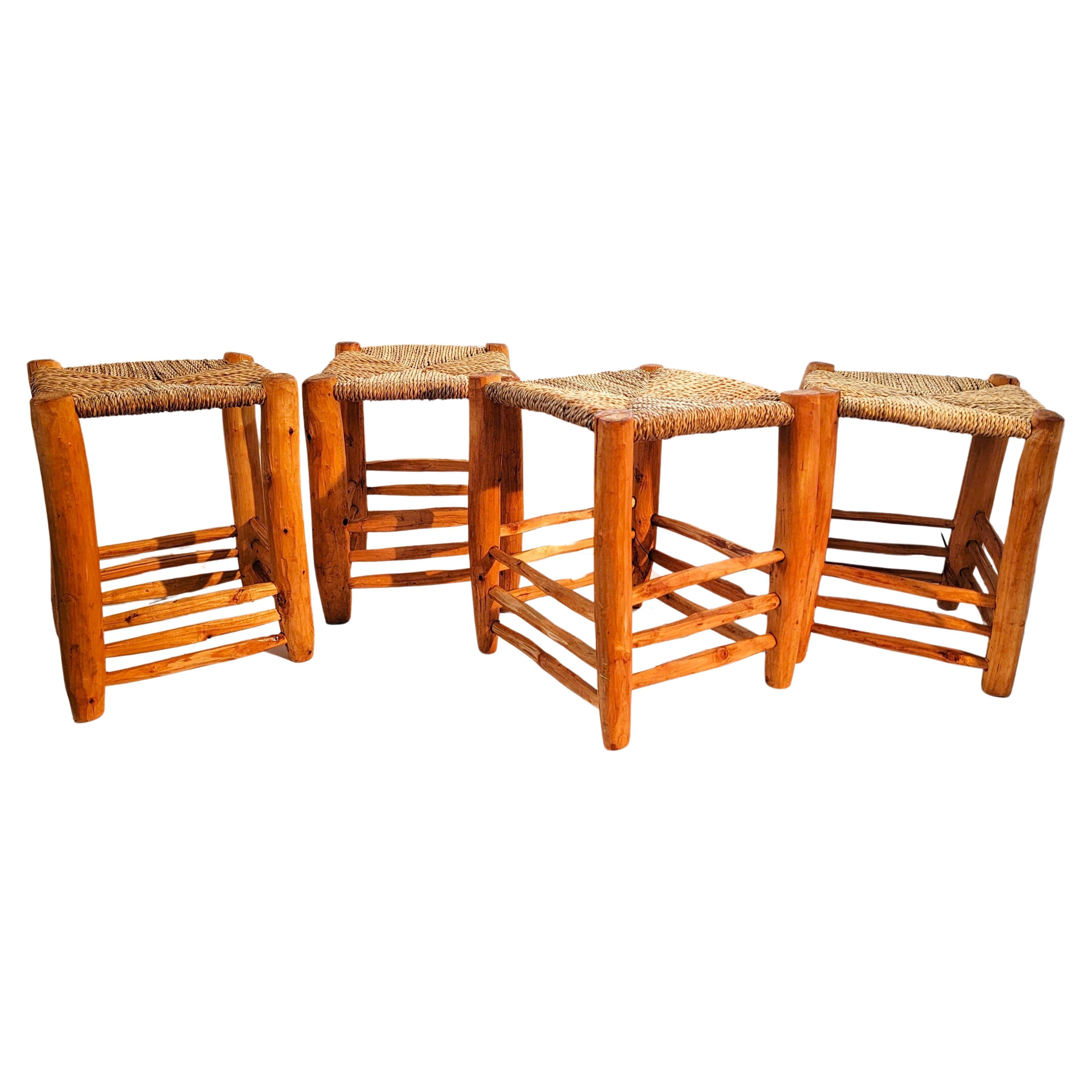 These amazing hand carved pine stools have hand woven sea grass seats.The set are in pristine condition.Great at a low farm table or coffee table.Super for a child