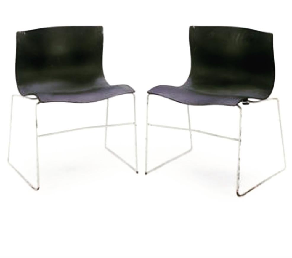 A great set of 4 chairs designed by Massimo Vignelli for Knoll, circa 1983, for Knoll studio great condition complete with rubbers chrome has been polished, the seats are very clean these chairs are nice and comfy. These chairs are stackable for