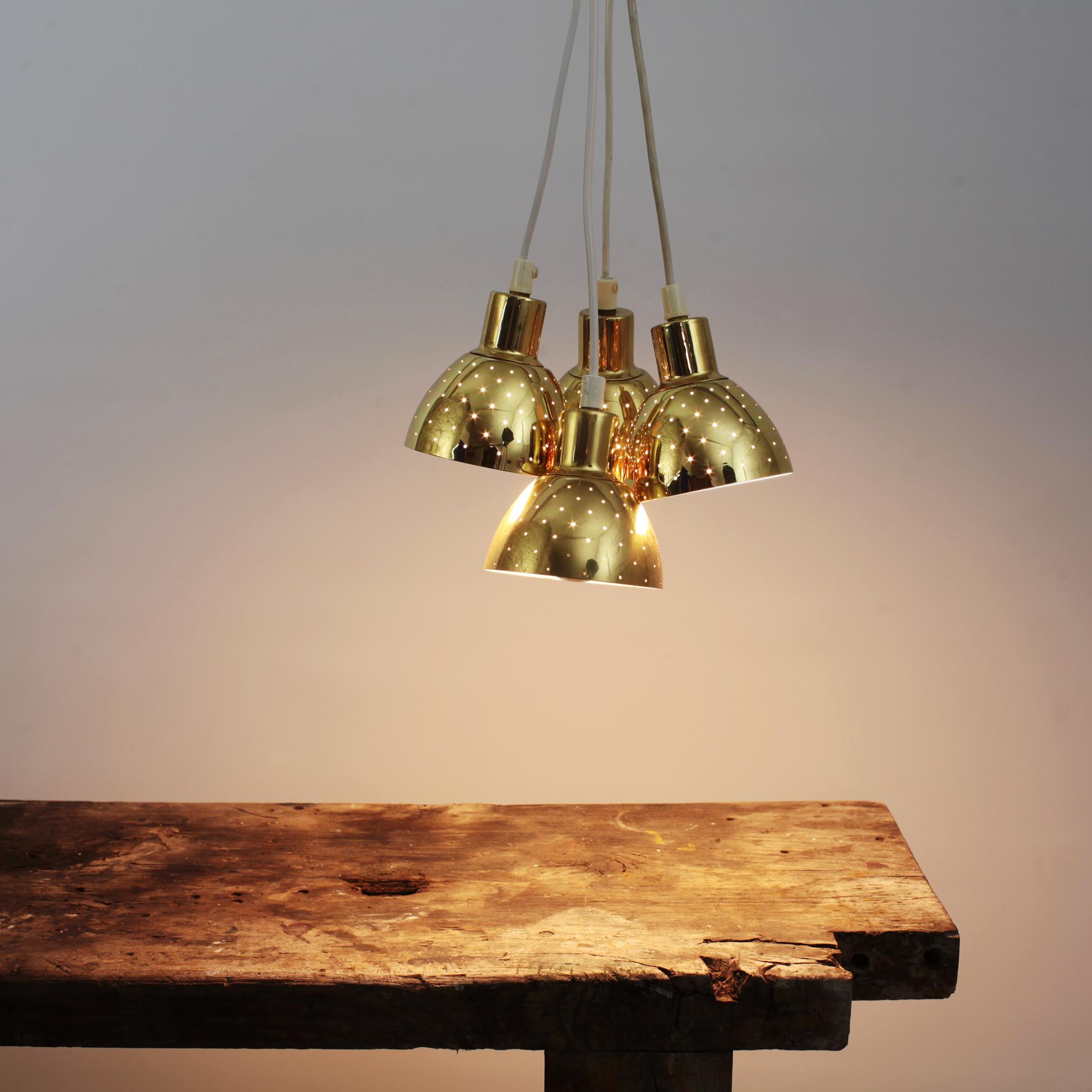 Set of 4 Hans Agne Jakobsson perforated brass pendants.
Model Flora or T 618 for Markaryd.
Sweden, 1960s.