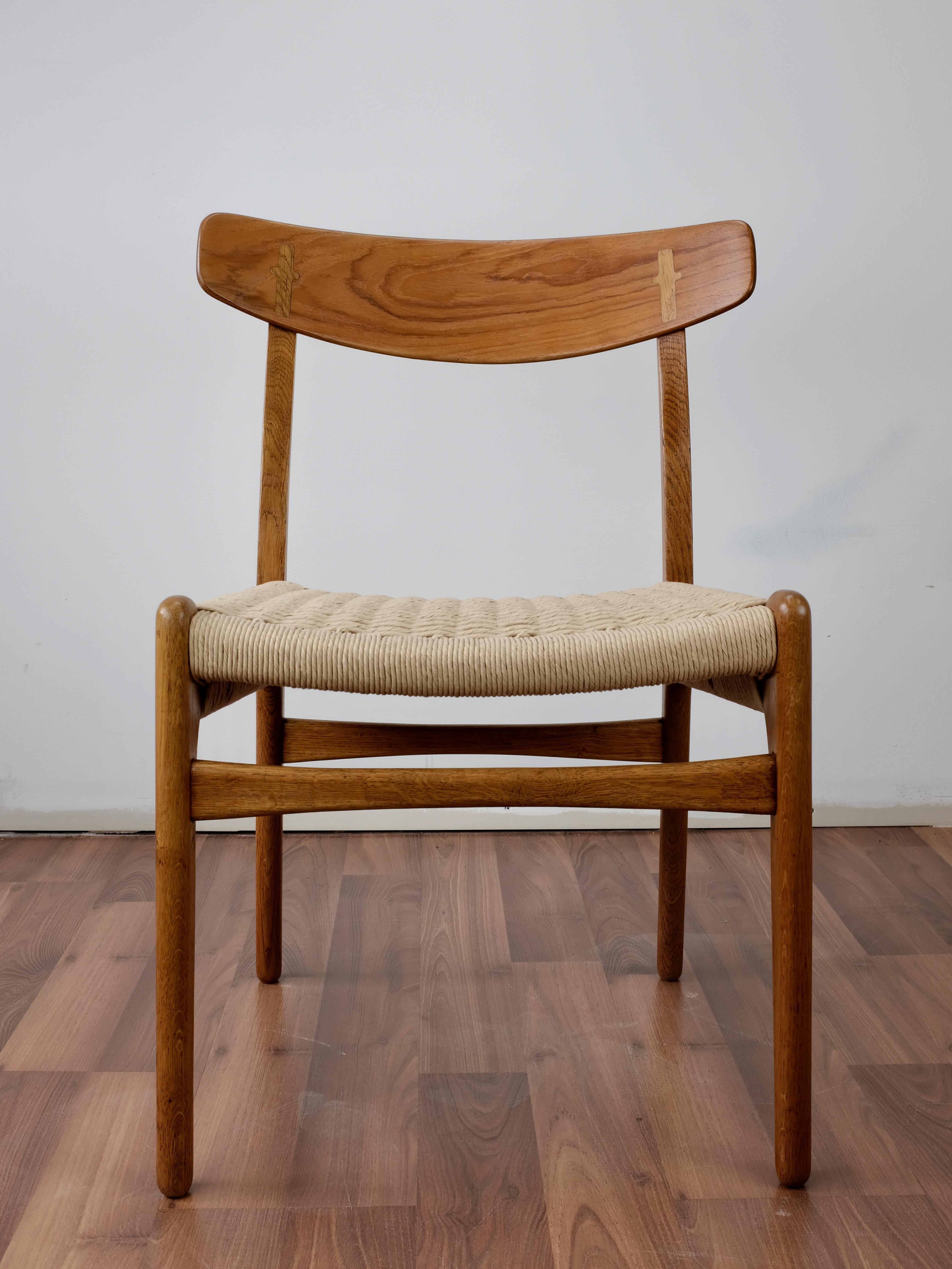 Scandinavian Modern Set of 4 Hans Wegner CH23 Dining Chairs in Teak and Oak For Sale