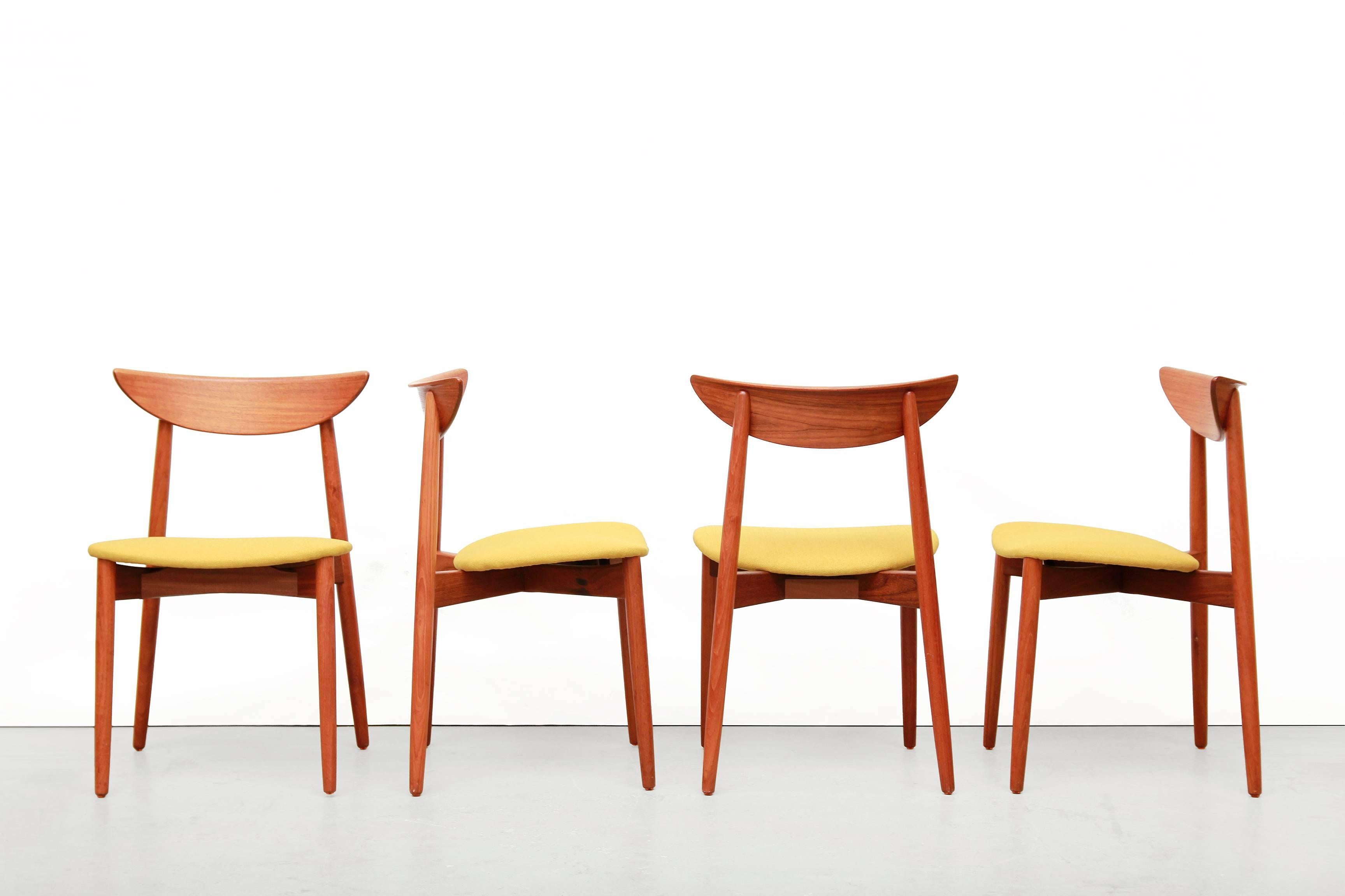 Nice set of four Harry Ostergaard dining chairs produced by Randers Mobelfabrik, Denmark in the early 1960s. These airy designed chairs are made of solid teak with beautifully handcrafted wood connections. These chairs are of high quality. The