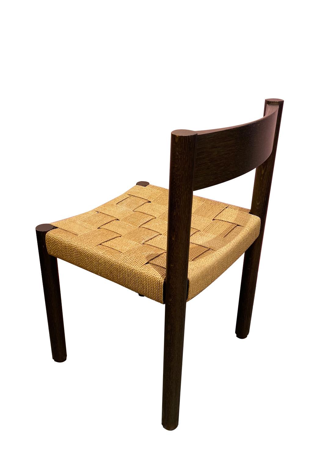 Set of 4 dining chairs by Robert Haussmann for Dietiker, Circa 1960. In Good Condition In Renens, CH