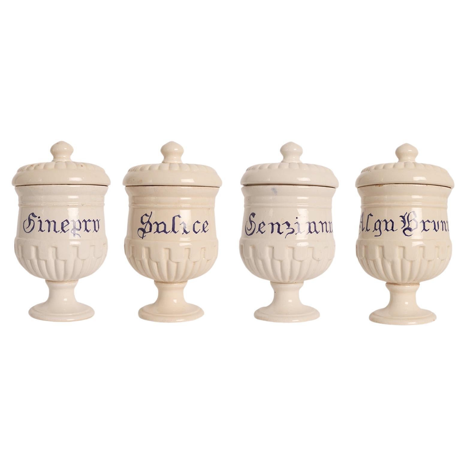 Set of 4 herbalist pharmacy ceramic jars, Italy 1890.