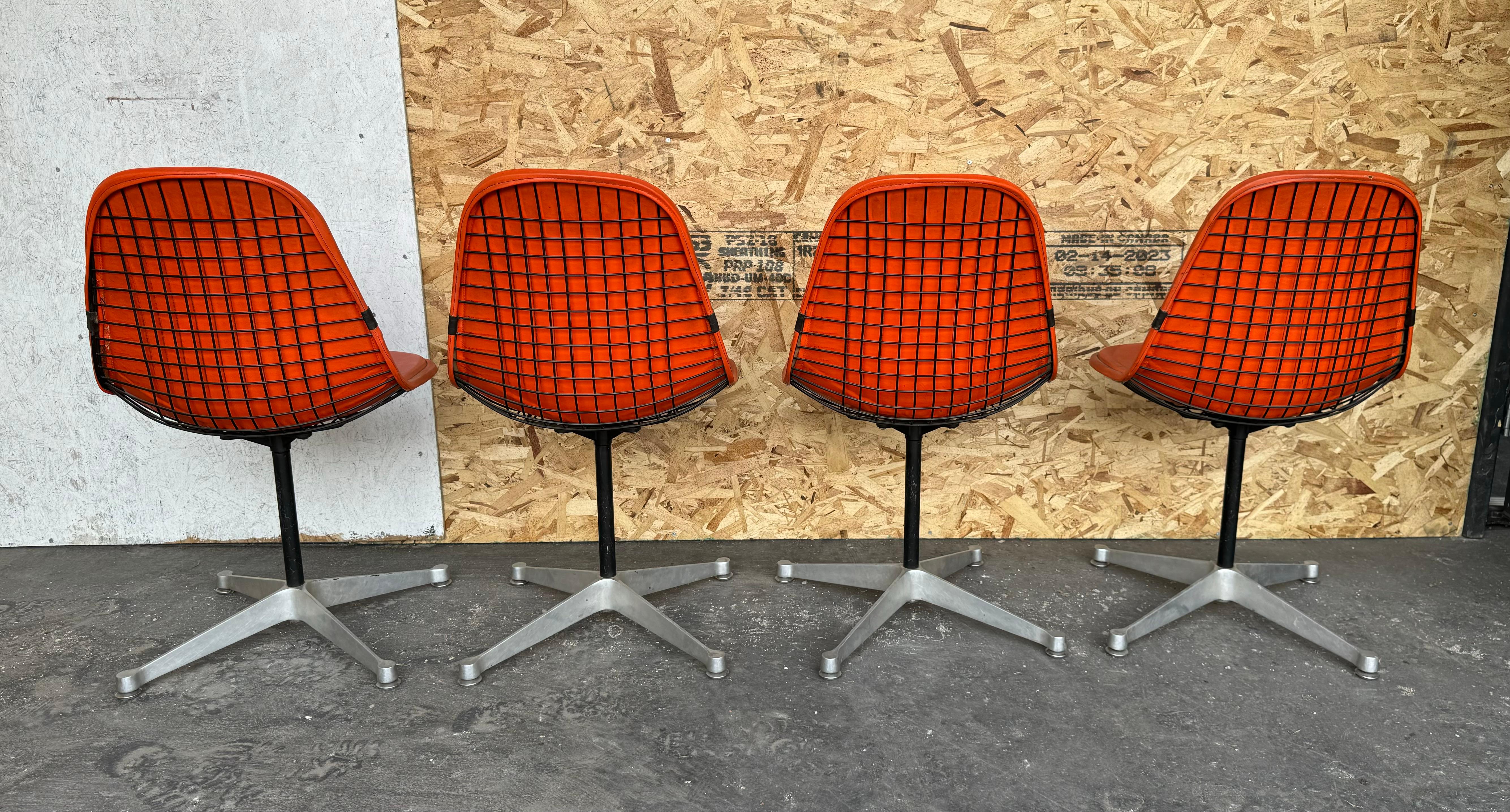 Iron Set of 4 Herman Miller Eames Orange Pad Swivel PKC1 aluminum base Dining Chairs For Sale