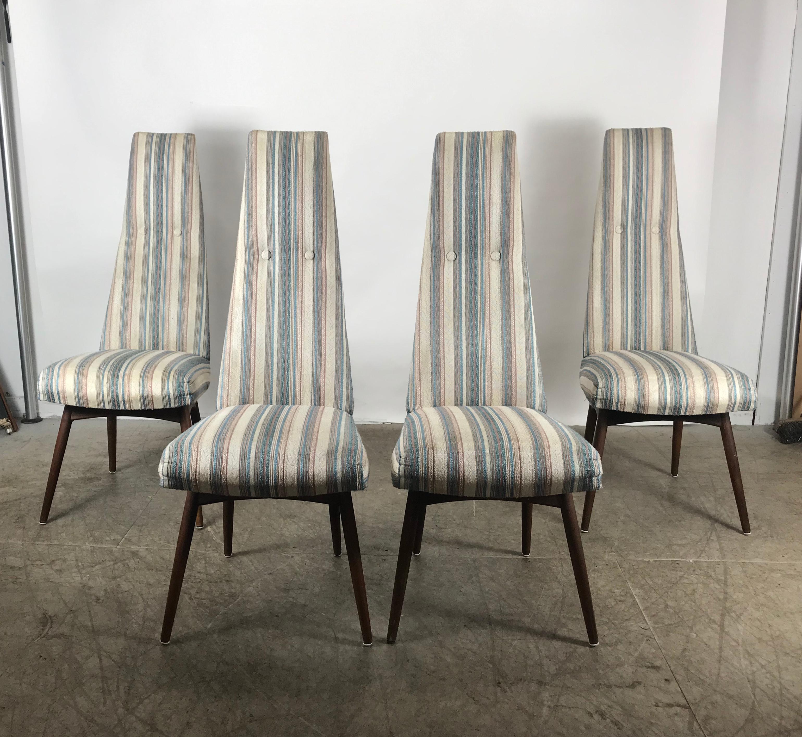 This gorgeous set of four vintage modern dining chairs feature an unusual high backrest ensuring maximum comfort. Stylish design with splayed and tapered walnut legs adding to the allure. Retain original wool fabric upholstery in nice original