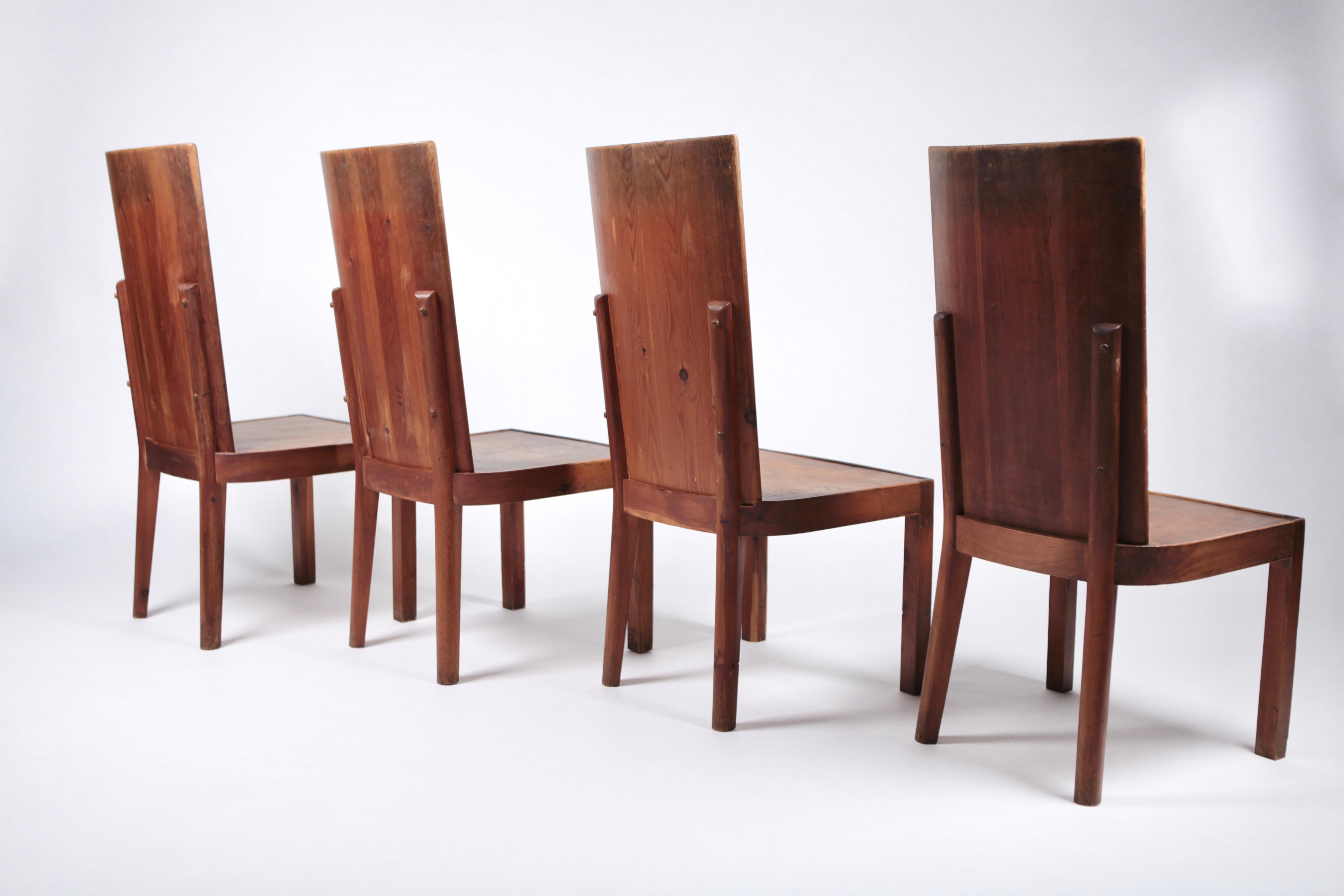 Mid-20th Century Set of 4 High Back Stained Pine Chairs, Attributed to Axel Einar Hjorth, Sweden  For Sale