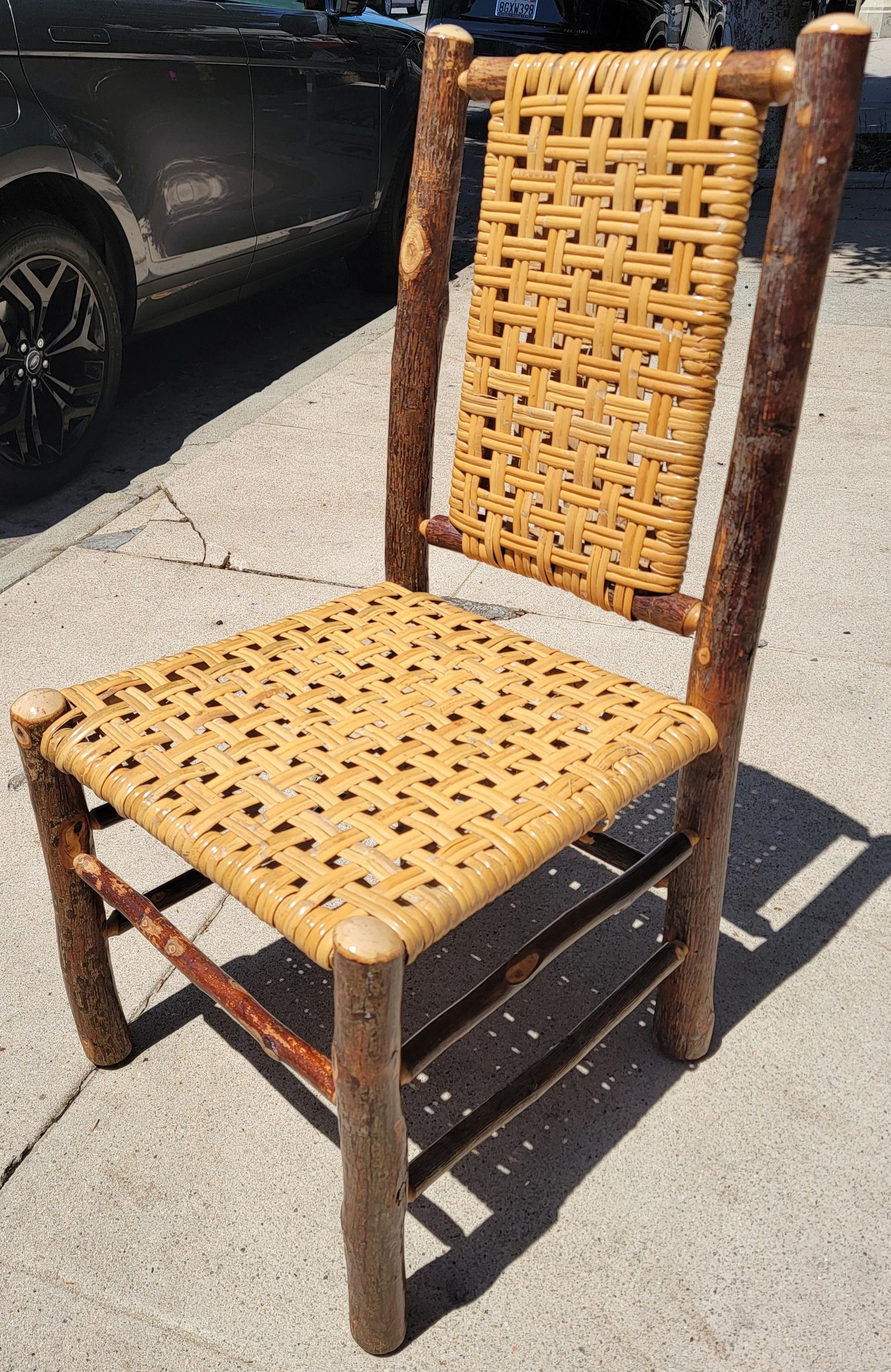 Set of 4 hign back armless old hickory chairs. The chairs are in great condition. Can be used a Breakfast nook, dining chairs or side chairs.