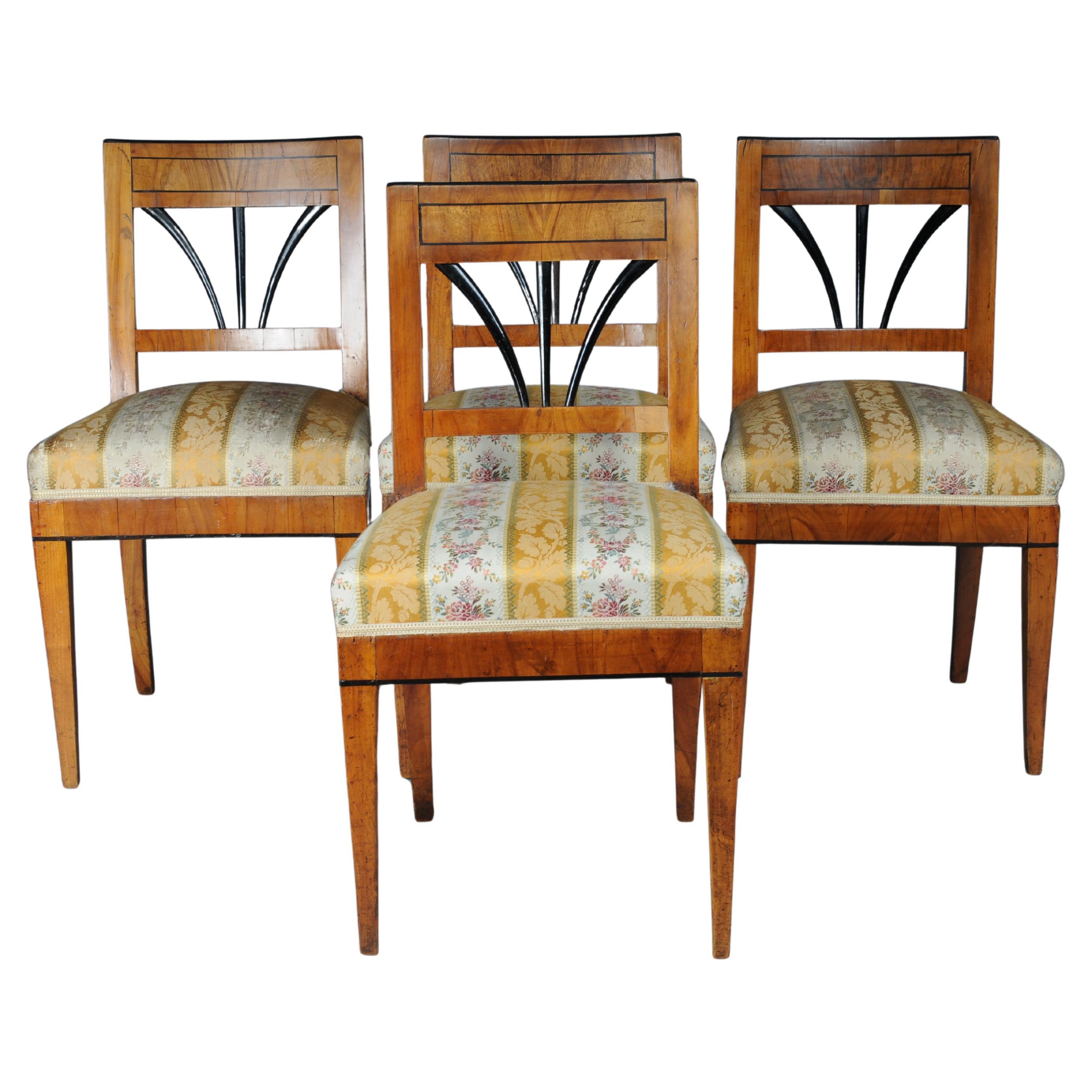 Set of 4 impressive Biedermeier chairs made of cherry wood and ebonized around 1