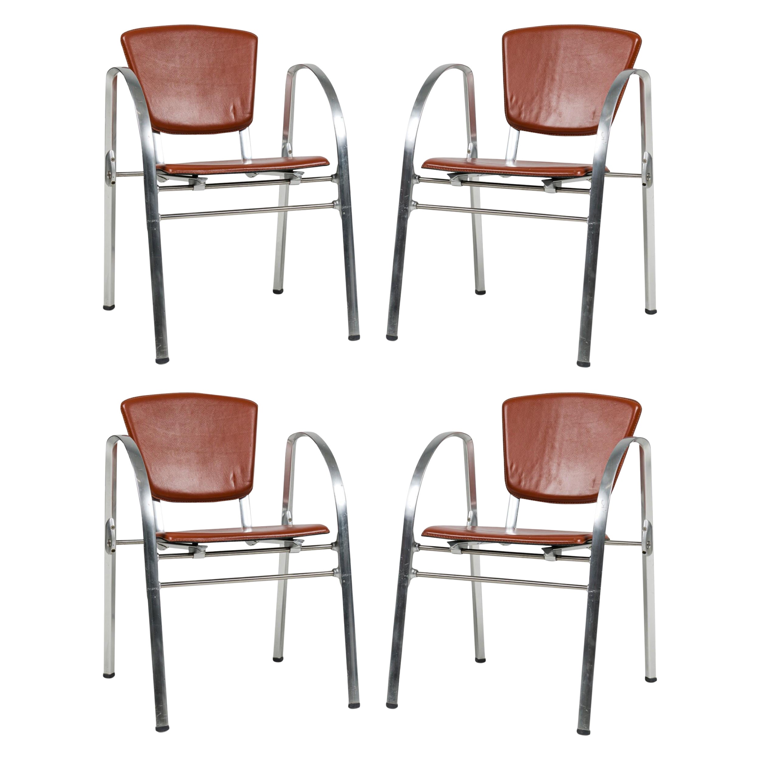 Set of 4 Indecasa Spanish Mid-Century Rust Leather and Chrome Arm Chairs For Sale