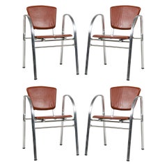 Set of 4 Indecasa Spanish Mid-Century Rust Leather and Chrome Arm Chairs