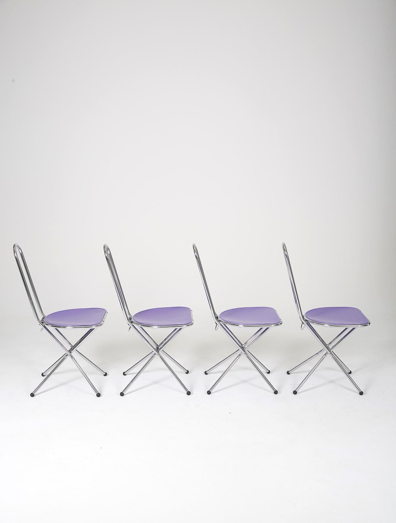 4 ISAK folding chairs by Niels Gammelgaard for Ikea, 1980s. Made in Italy, Swedish design. Chromed metal structure and purple plexiglass seat. Very good original condition with some superficial scratches on the seat and traces of use on the base.