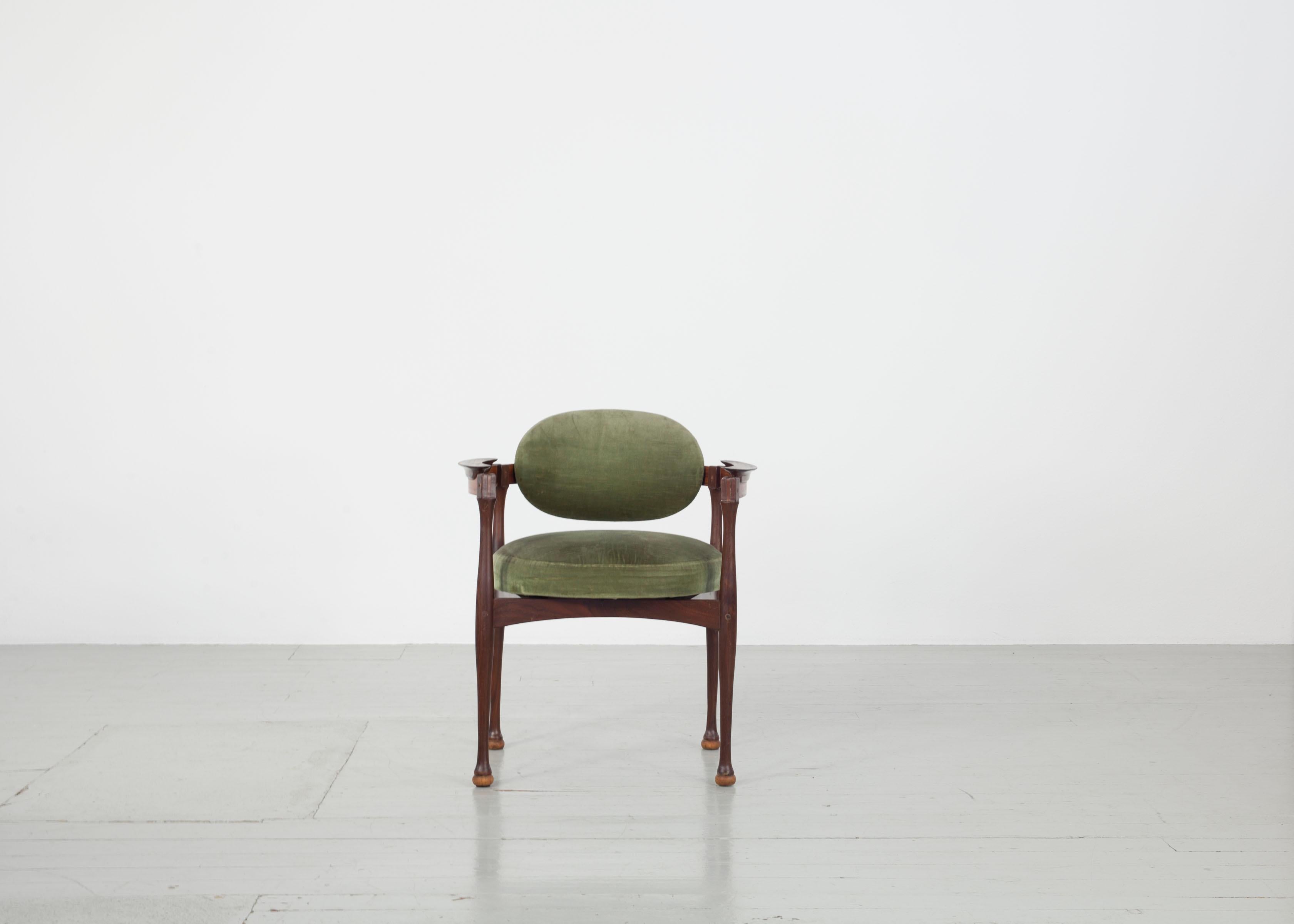 Set of 4 Italian 1960s armchairs made of teak with green velvet cover.