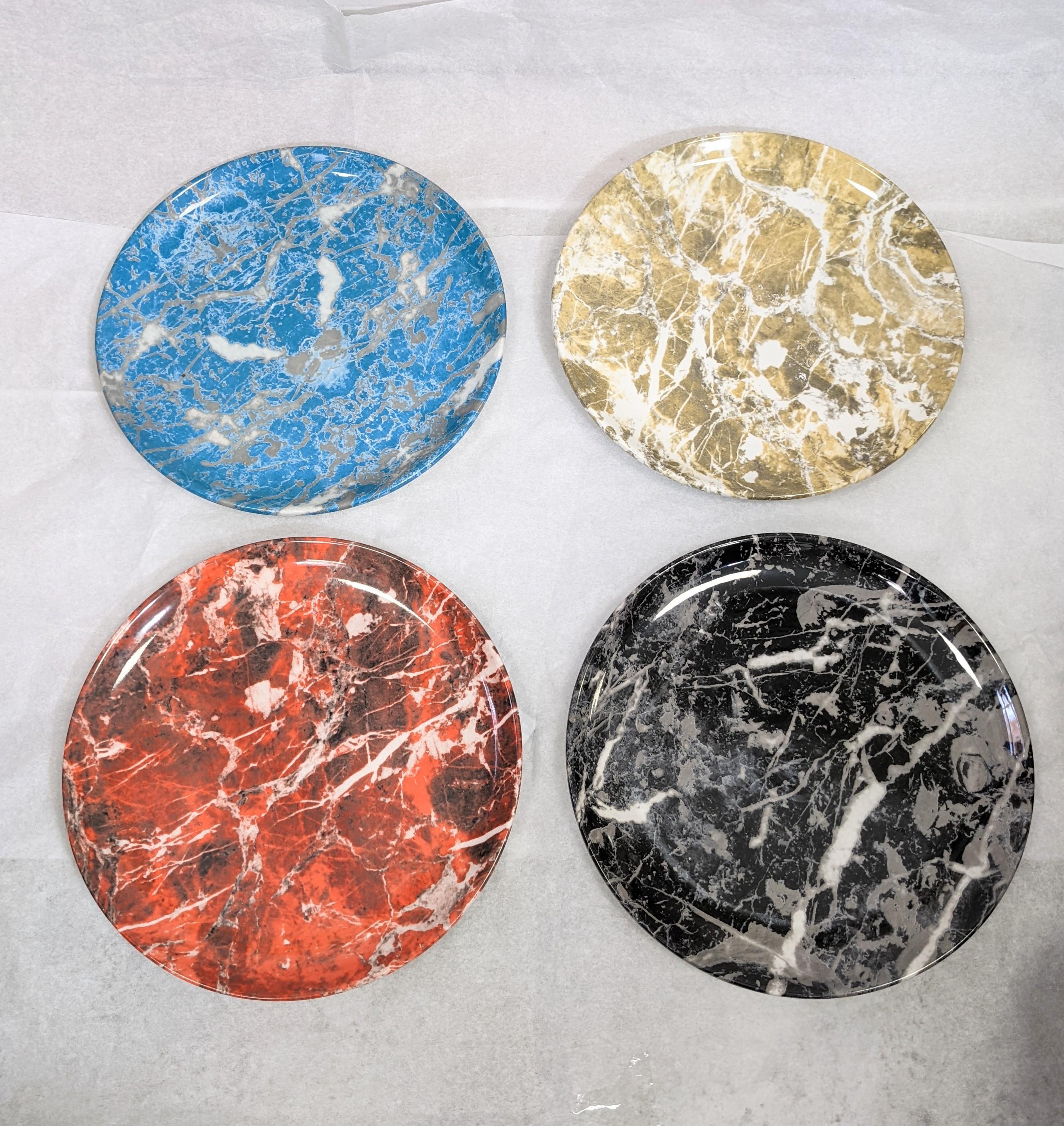 Set of 4 faux marble printed plates from the 1980's. Manufactured by Ancora, these were samples, never used and have holes for wall mounting as well.
1980's Italy.