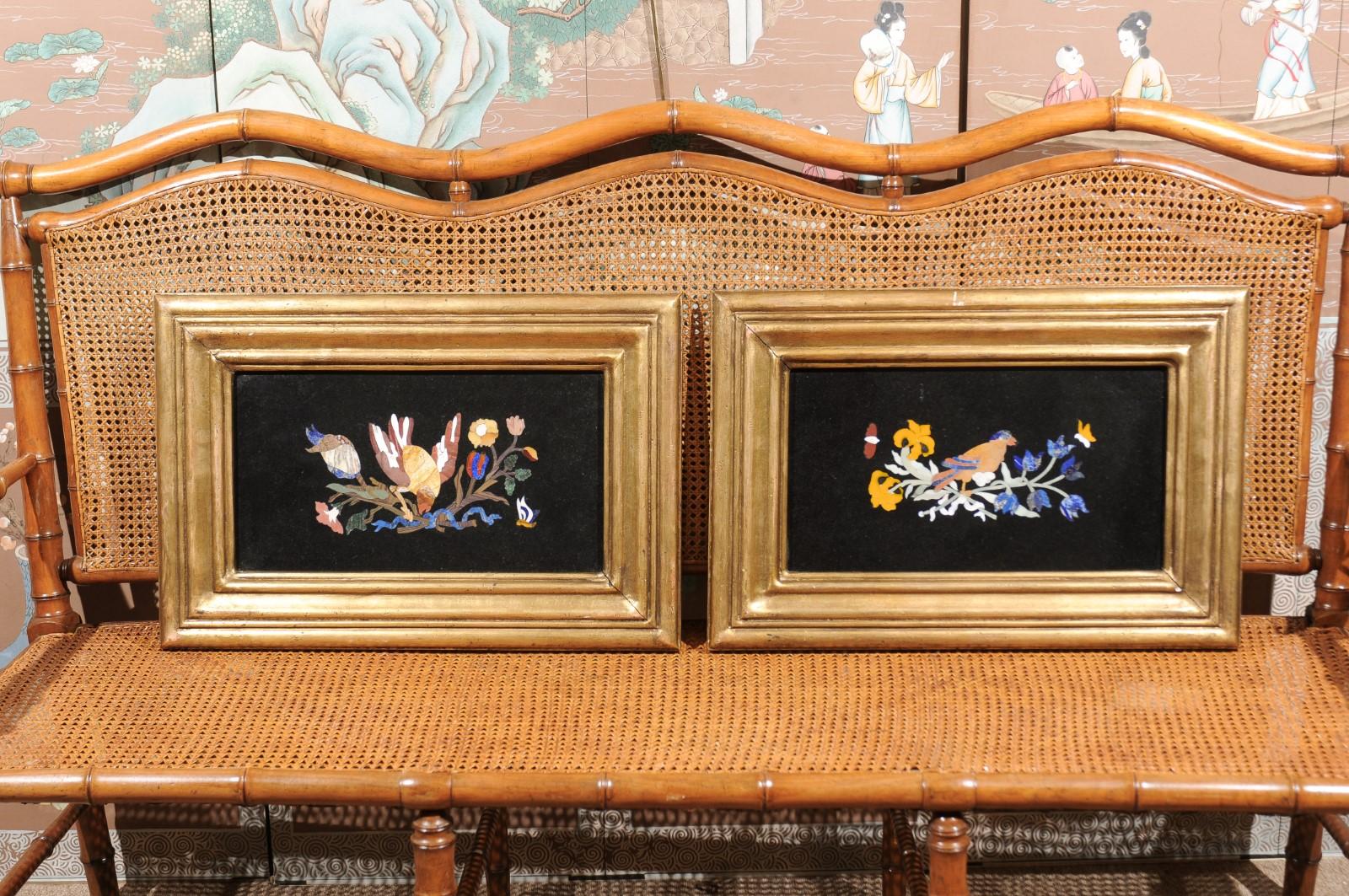 A set of 4 Italian giltwood framed Pietra Dura specimen marble plaques of foliage and birds.