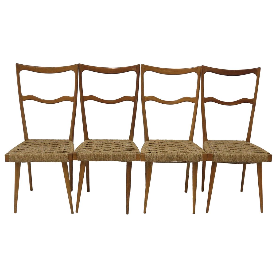 Set of 4 wood Italian ladder back chairs with wood frames and woven rush seats. In the manner of Gio Ponti.