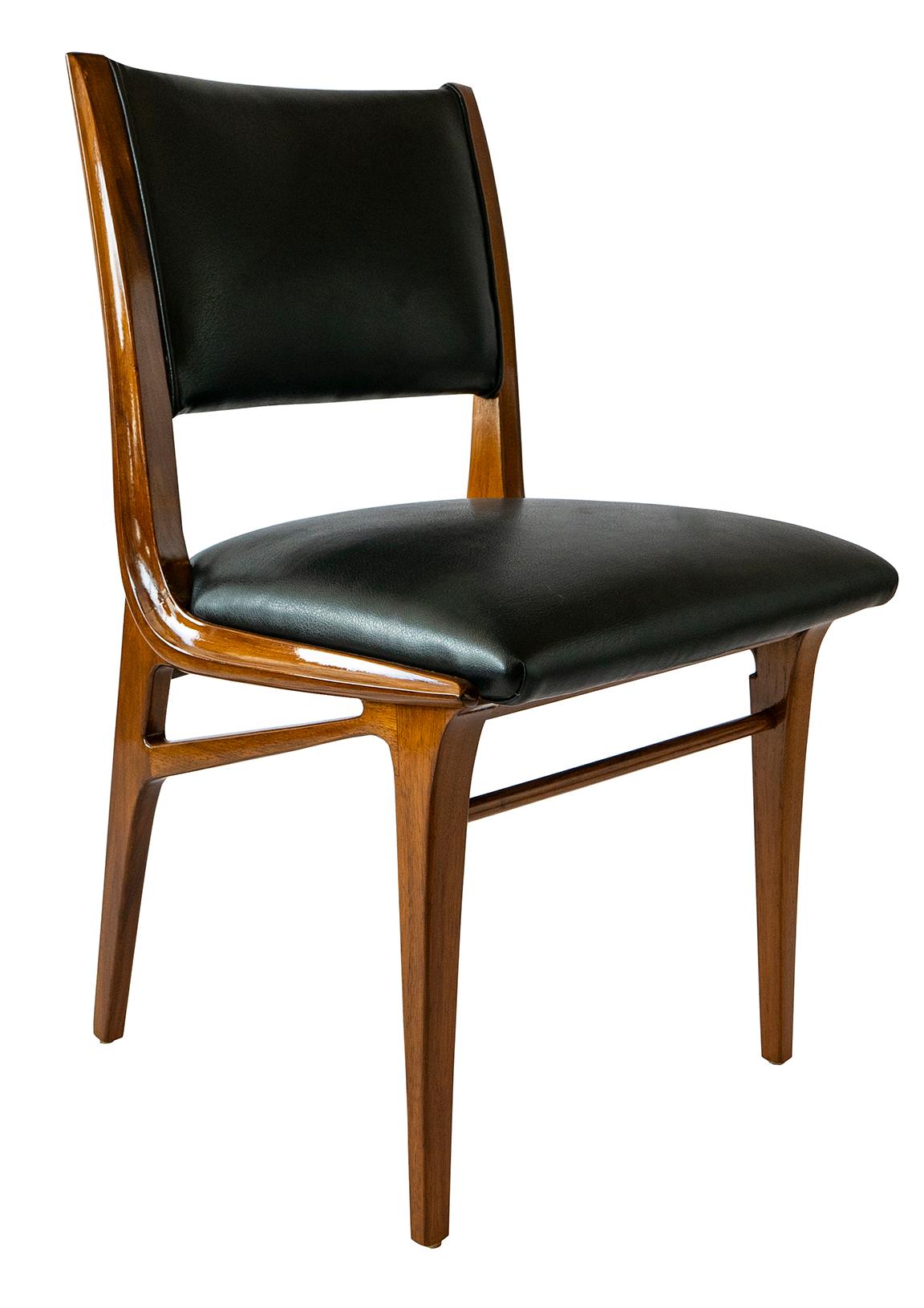 Set of 4 Italian modern walnut side/dining chairs- related examples in de guttry il mobile d'italiano degli anni 50 e 60 - excellent restored condition- newly upholstered.
  