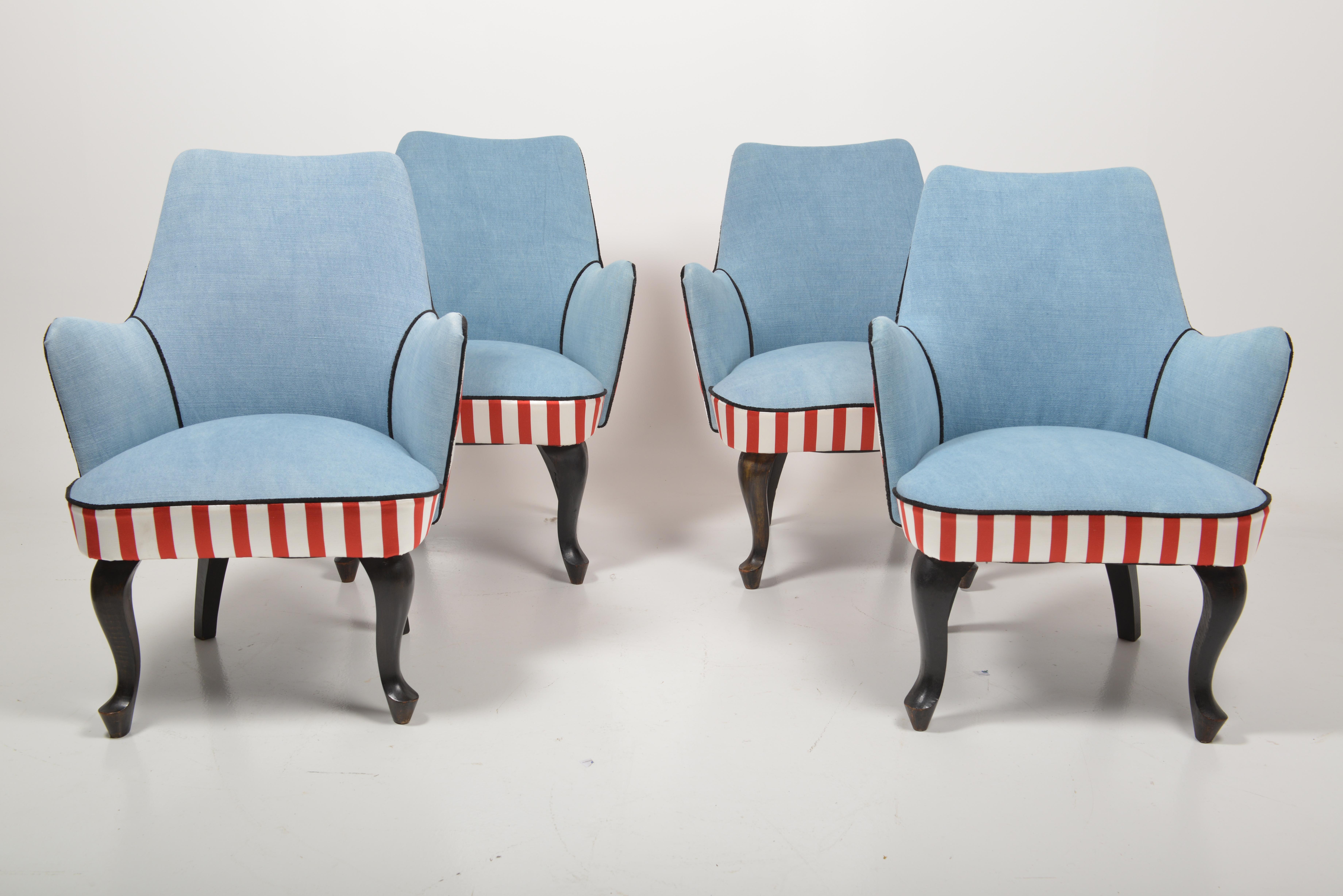 Extremely charming Italian set of four small side chairs in ebonised wood with cabriole legs and scroll foot. They are small sized and therefore ideal to maximize seating in a narrow space. We reupholstered them in a faded denim fabric and for the