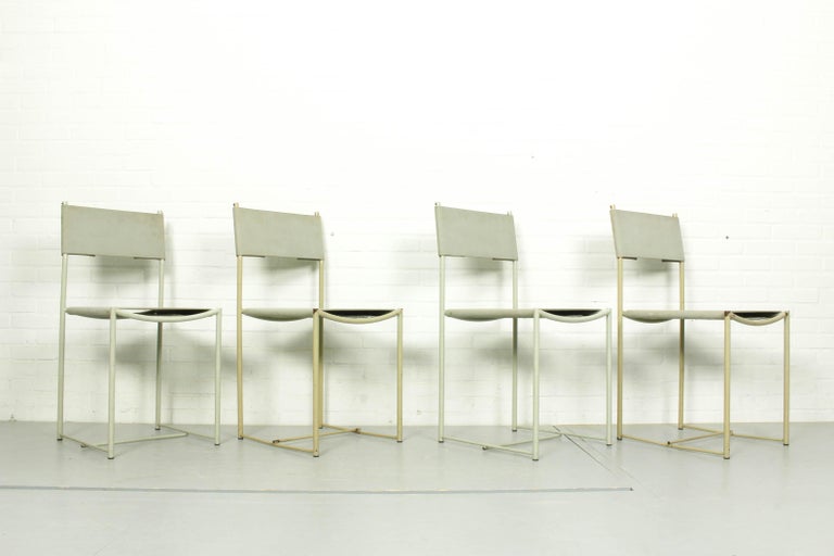 Italian Spaghetti chair by Giandomenico Belotti for Alias, 1980s. Spaghetti chair with off white/light grey painted metal structure, seat and back in canvas. 

Dimensions: 84cm H, 53cm D, 40cm W. 
 