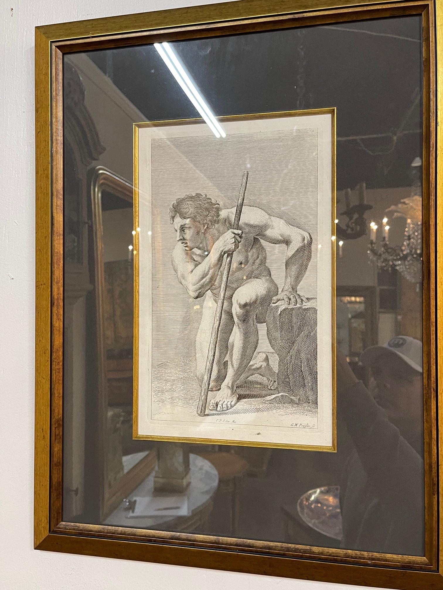 Gorgeous set of 4 Italian vintage black and white copper engravings featuring a muscular male form. Beautifully framed and matted. Makes a great accessory!