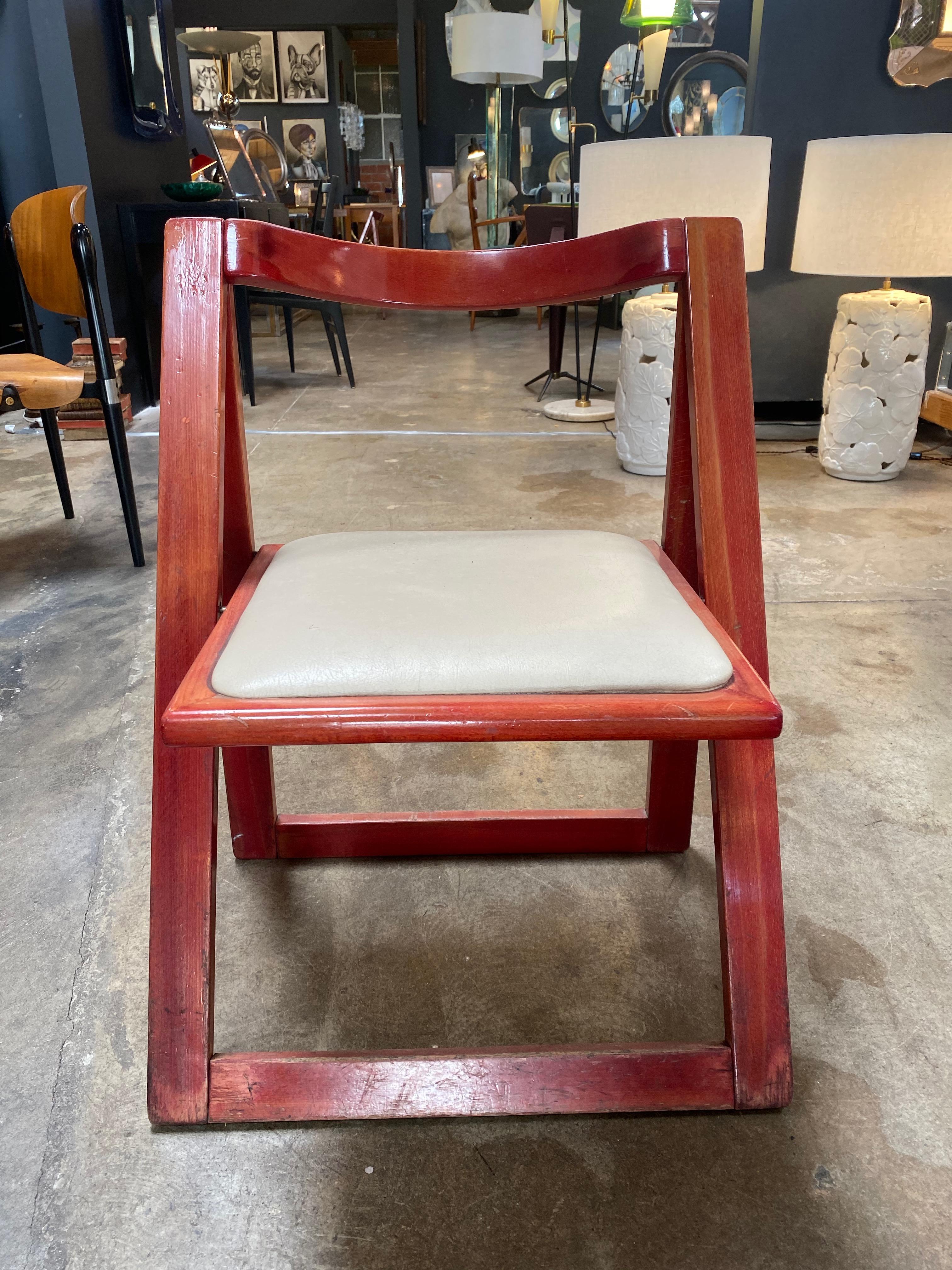 vintage wooden folding chair with leather seat