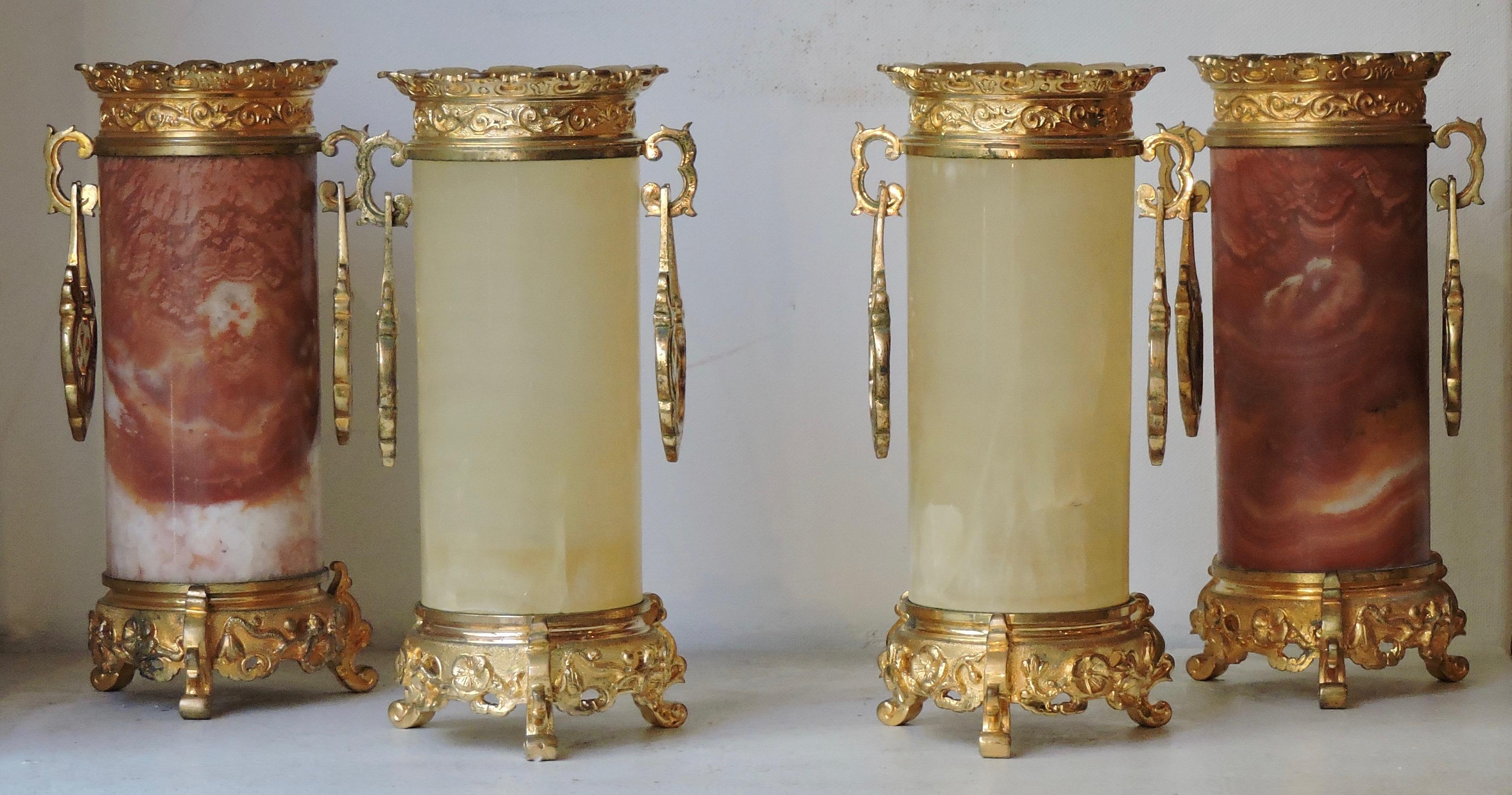 A set of four japonisme pink marble Onyx and ormolu tubular vases in the style of Edouard Lièvre, 
circa 1885.