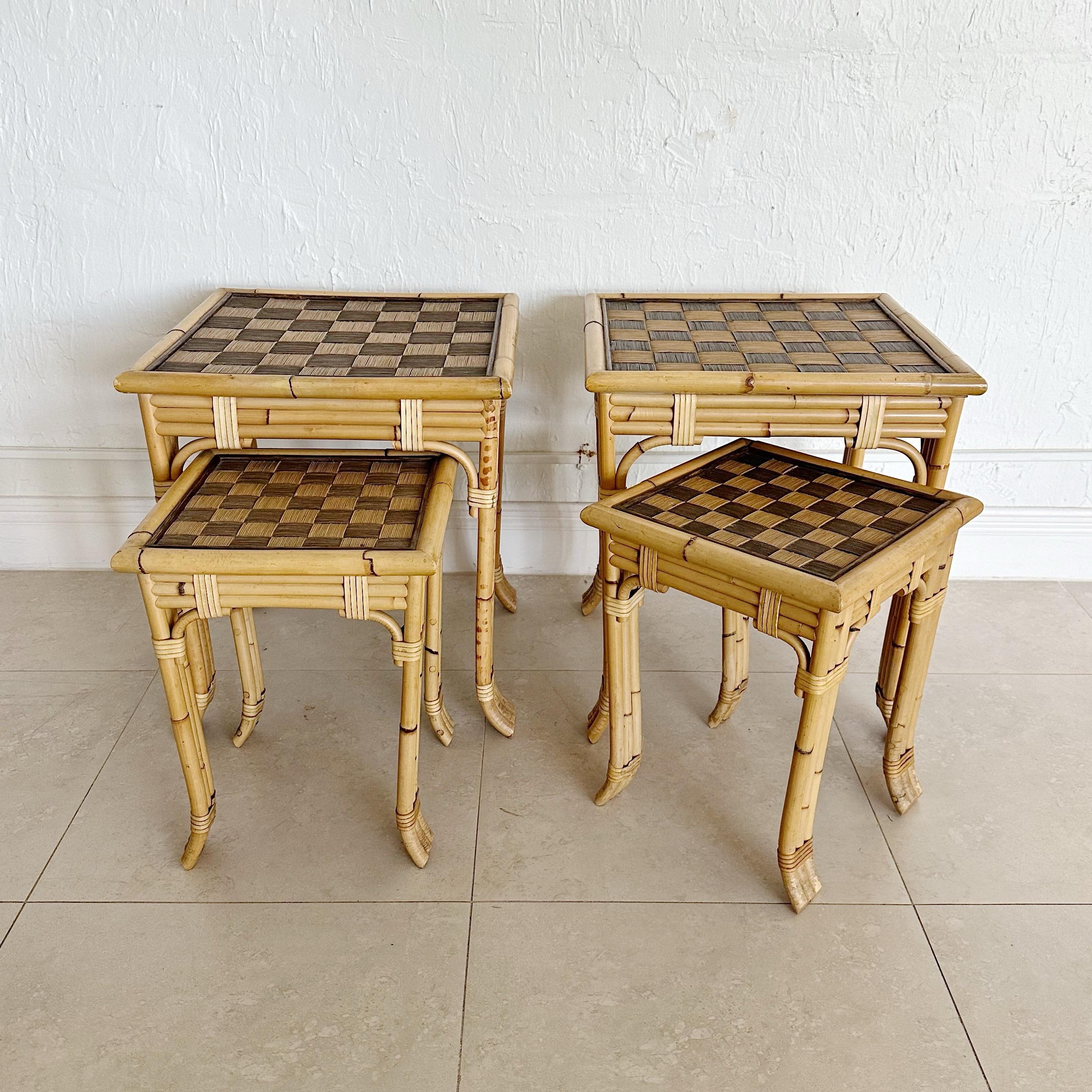 Vintage John Hutton for Donghia rattan, bamboo and wicker wrapped nesting tables. Feature a woven rattan checkerboard pattern on tops. In great vintage condition. Signed on underside. Larger Tables Measure: 18ʺW × 18ʺD × 21ʺH Smaller Tables Measure: