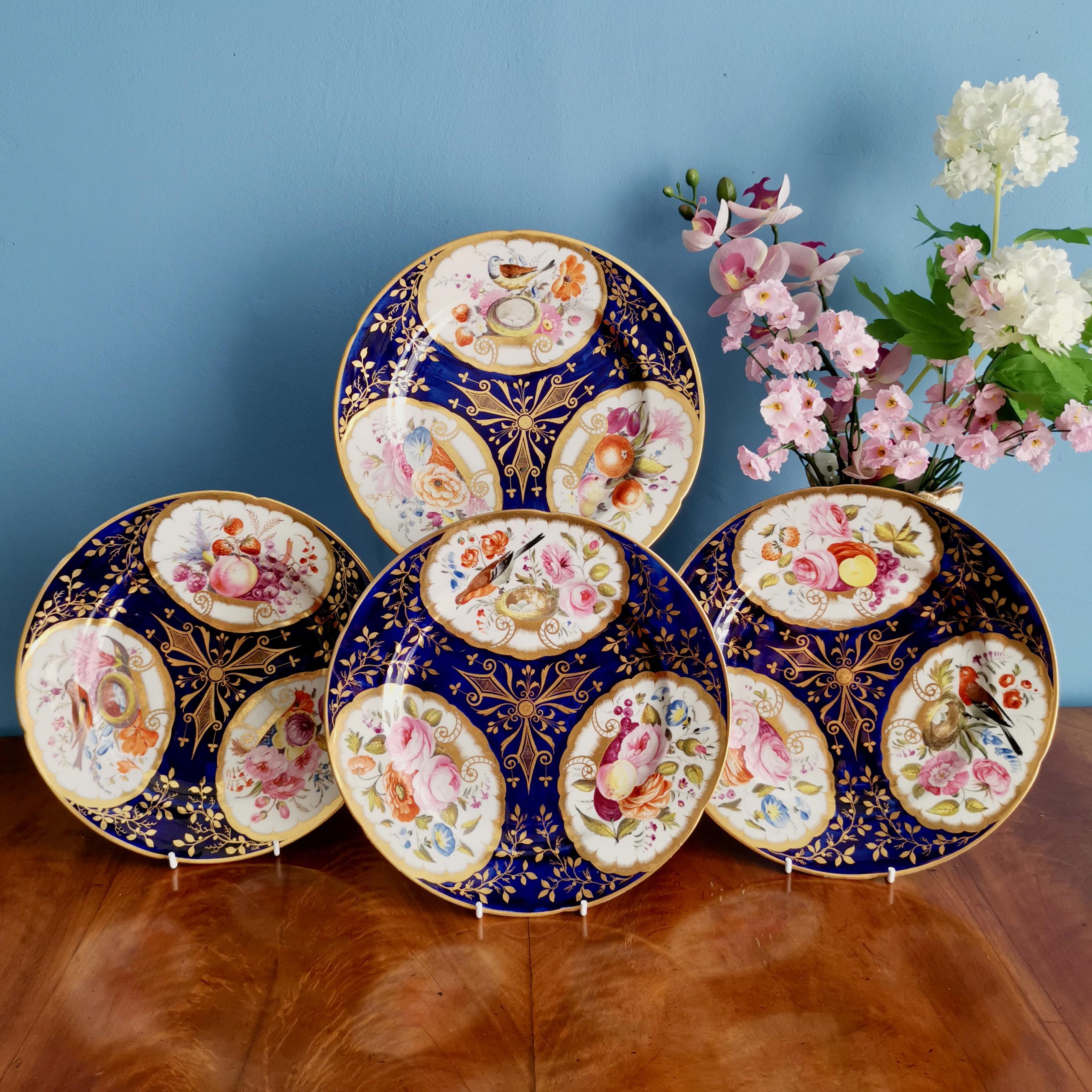 This is a set of four beautiful dessert plates made by John Rose at Coalport between 1805 and 1810. The plates have a cobalt blue ground, beautiful gilding and stunning reserves with hand painted birds and flowers.

Coalport was one of the leading