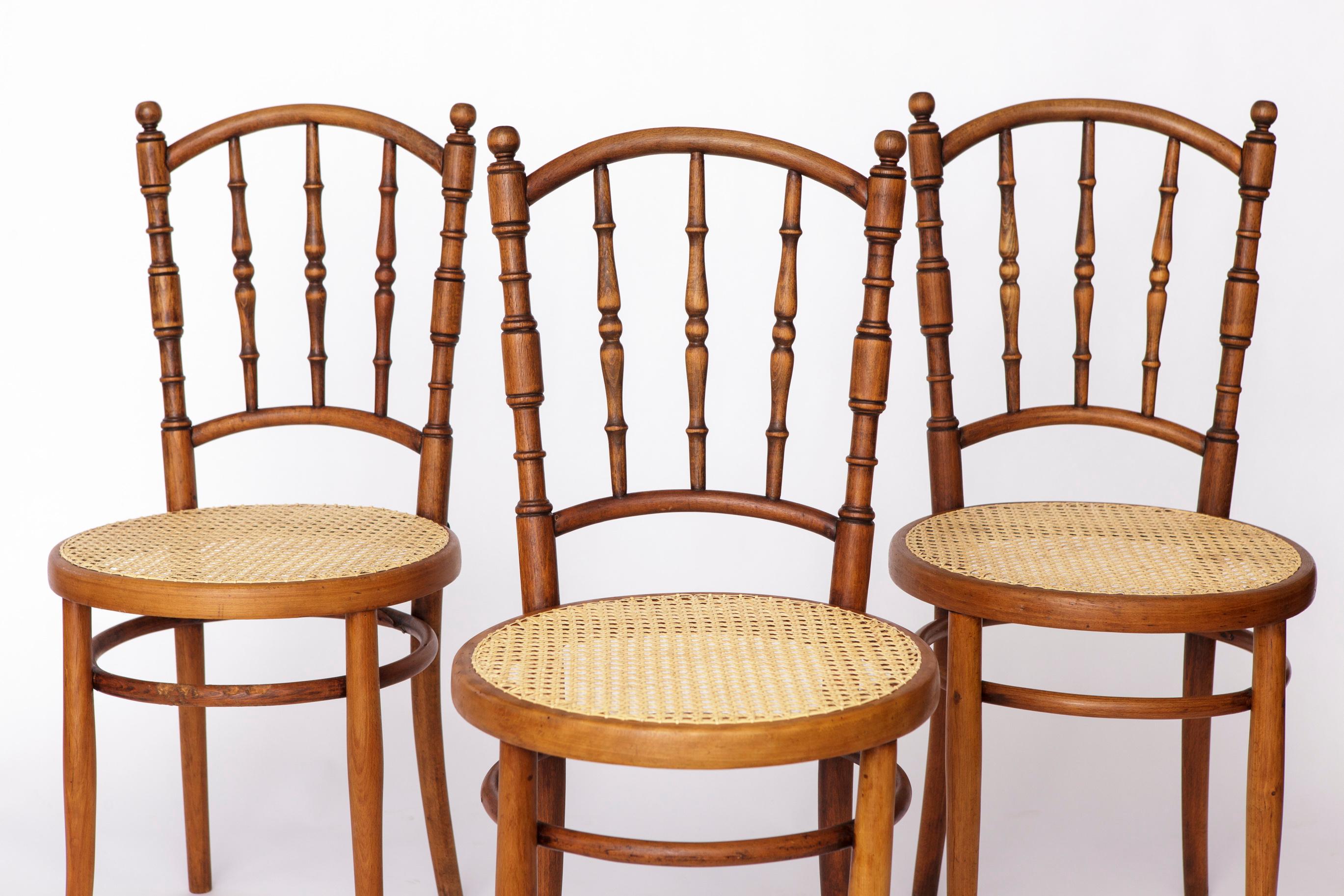 Set of 4 Bentwood Chairs by Josef Kohn (former competitor of Thonet), Austria
Production estimated between the 1930s–1950s.

Solid bentwood frames made of beechwood, carefully restored and oiled.
All chairs feature newly re-caned seats in