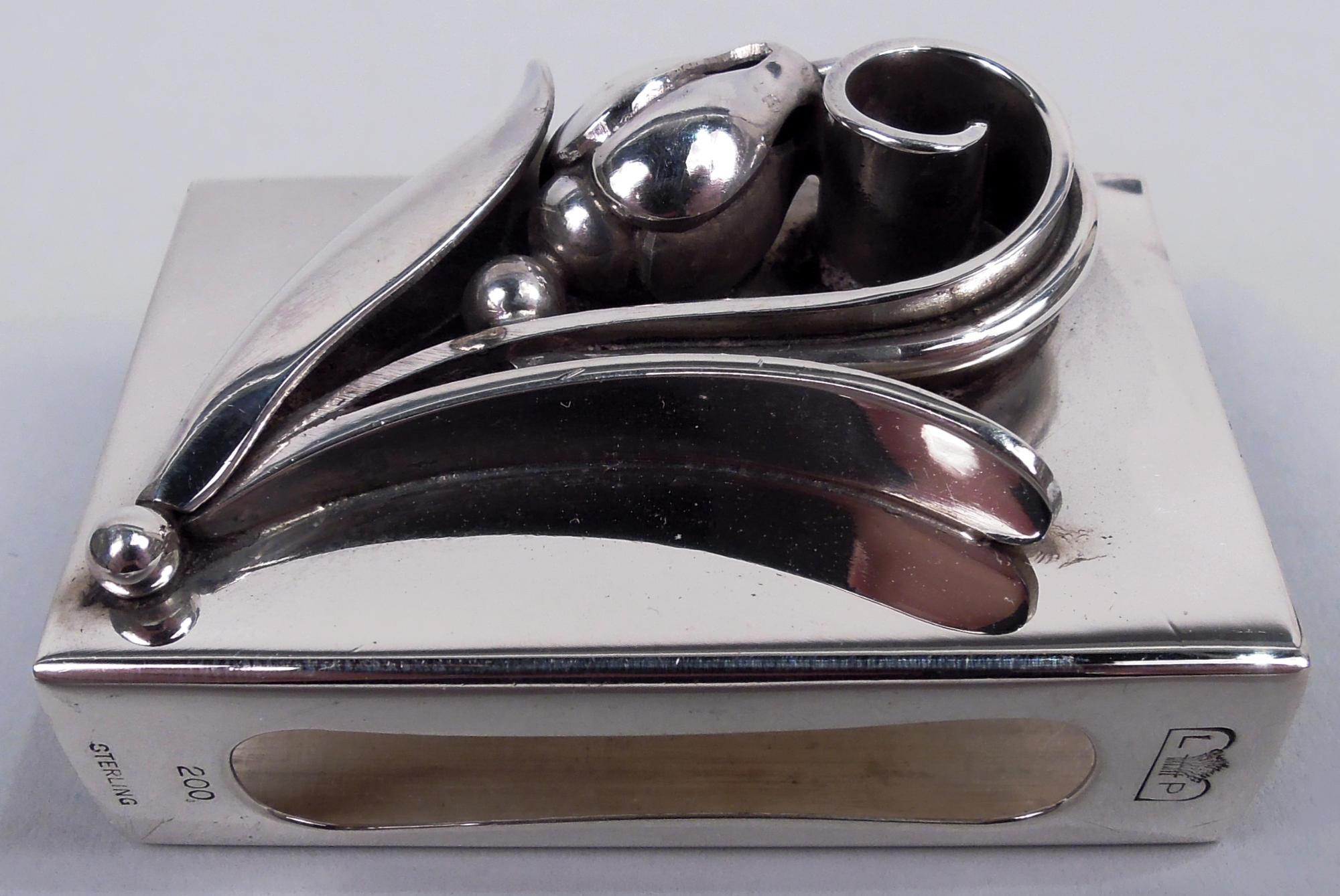Set of 4 Midcentury Modern sterling silver matchbox holders. Made by Alphonse La Paglia (d. 1953) in New Jersey. Rectangular; sides have cutout tubes for strike. Applied to top is seed-spilling bud enclosed in leafing tendril. A Jensen-inspired