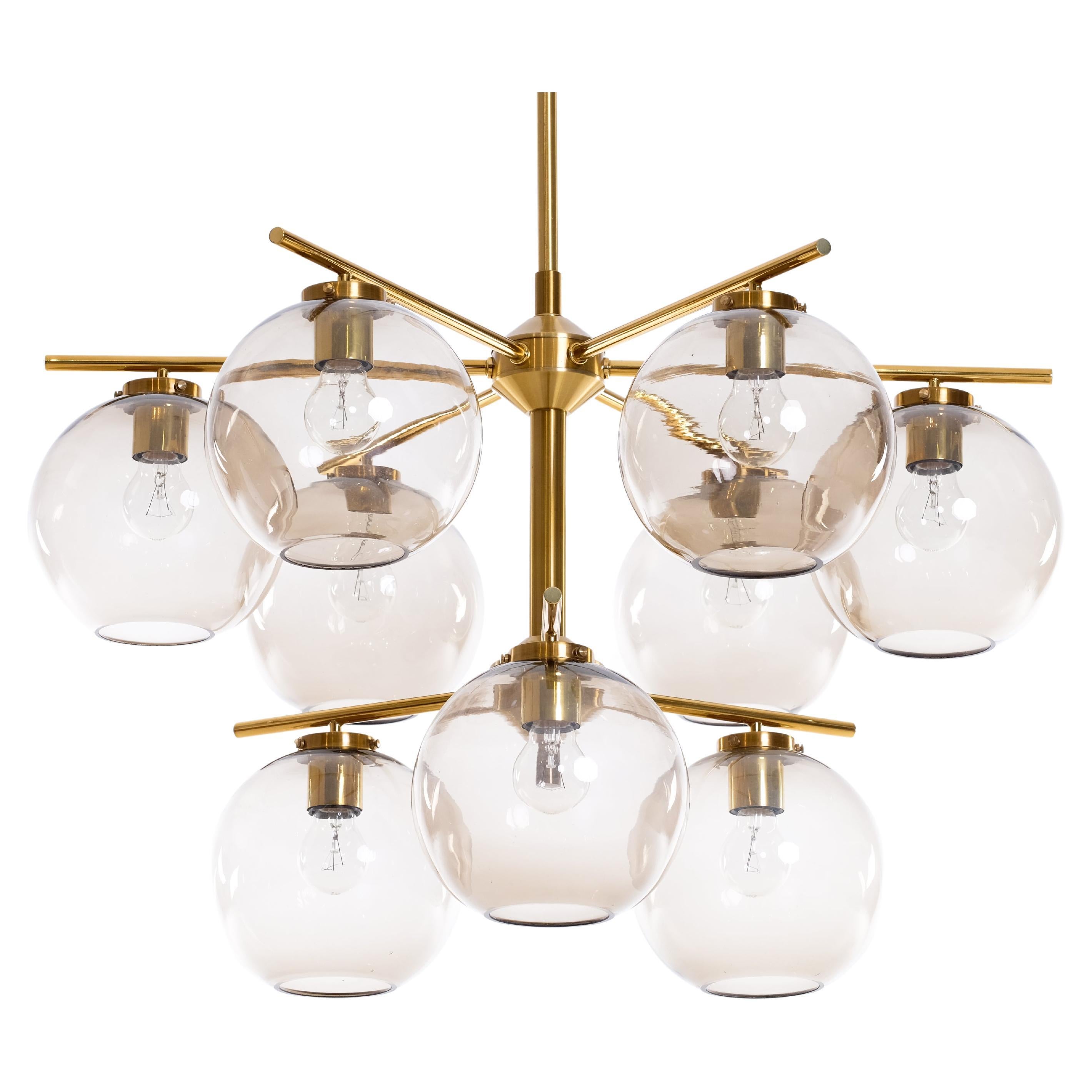 Set of 4 available. Designed by Holger Johansson and produced in Sweden by his own company Westdal, 1970s.
Please note: The height can be extended or shortened to your wishes.
Listed price is for one (1) chandelier. 
  