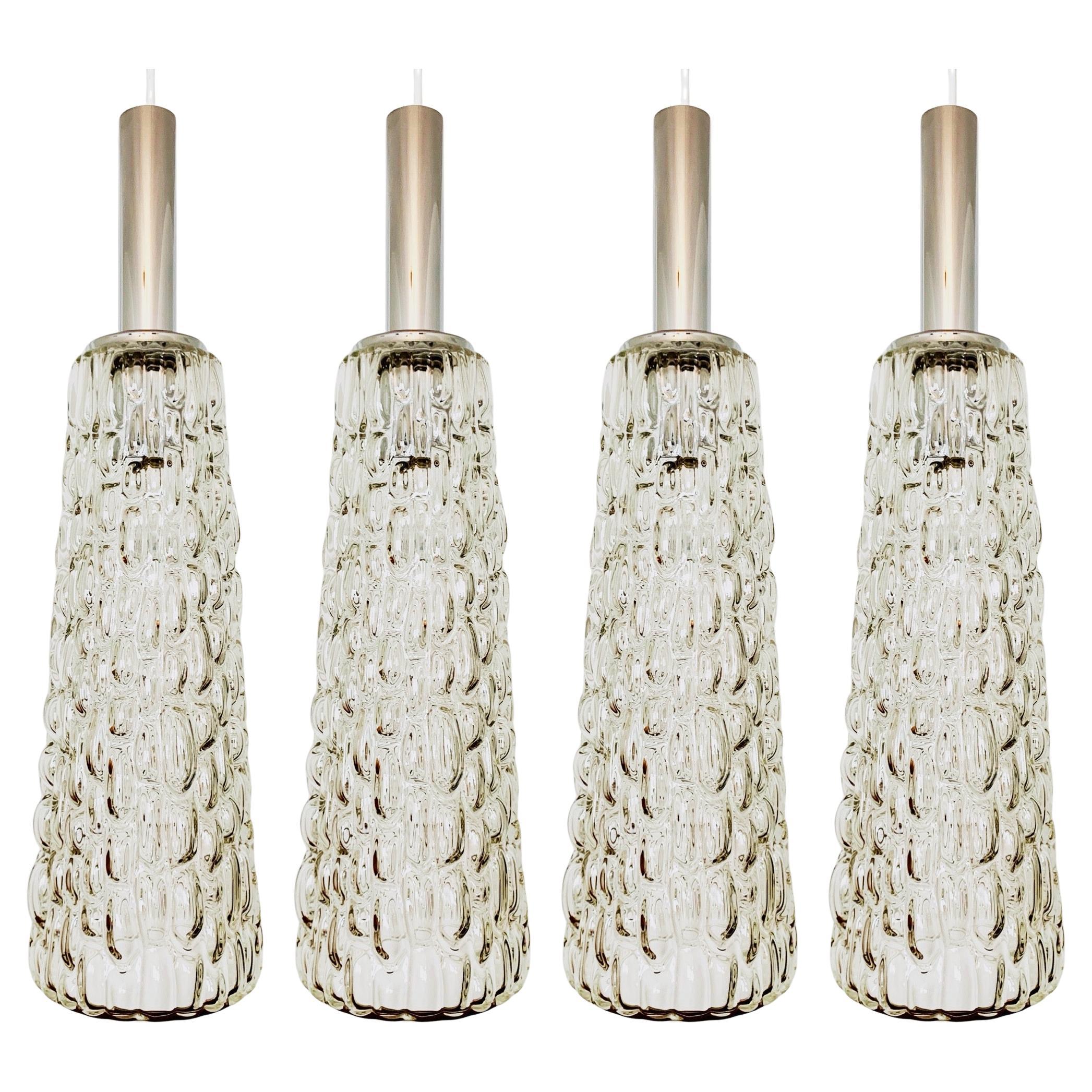 Set of 4 large crystal glass pendant lamps