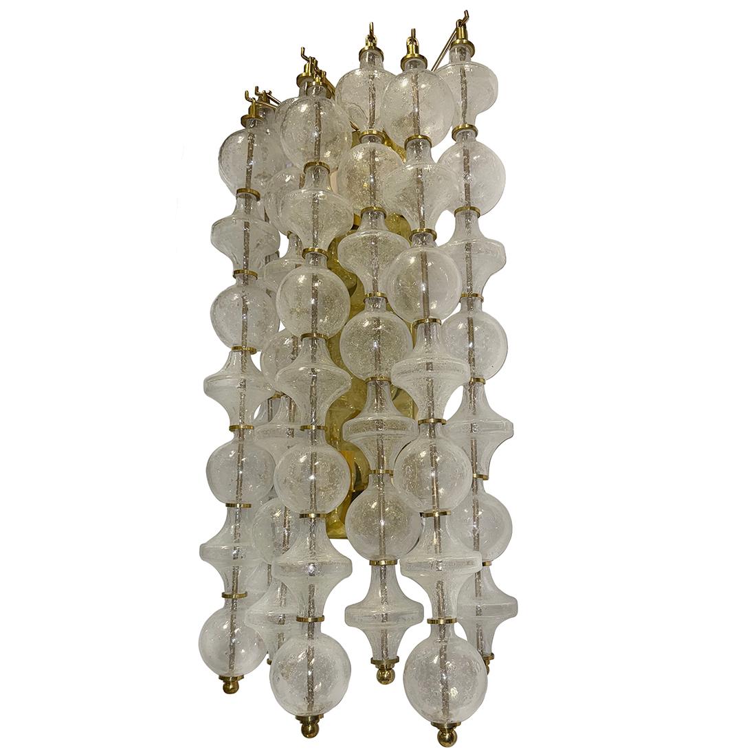 Set of 4 circa 1960's Italian blown glass sconces with 4 interior lights. Sold in Pairs

Measurements:
Height: 29