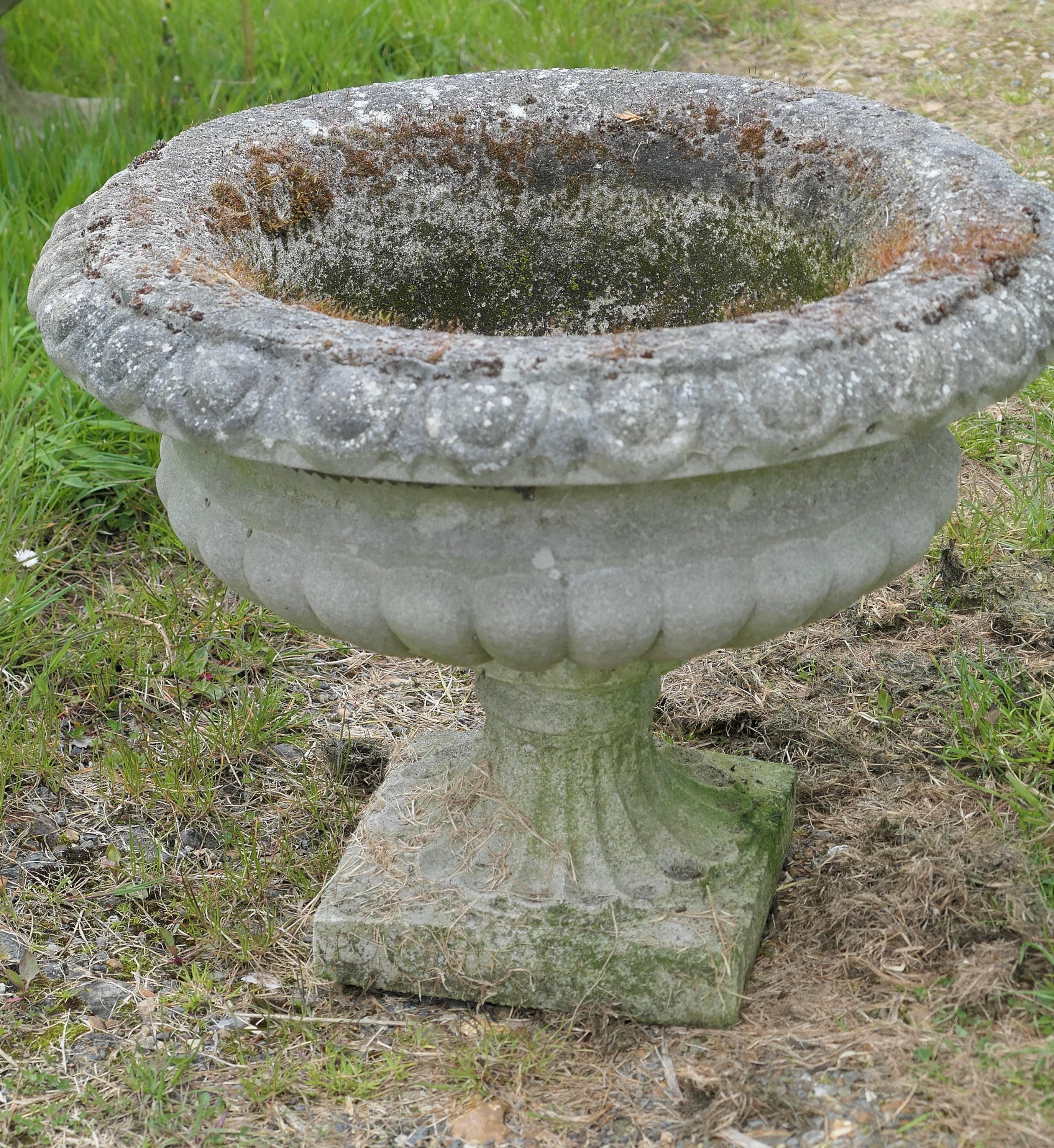 Set of 4 Large Weathered cast stone garden planters

A good set of early 20th century planters, they are well weathered and have drainage in the centre
In good sound condition, very heavy, they are 18” high, 24” in diameter
MS58.