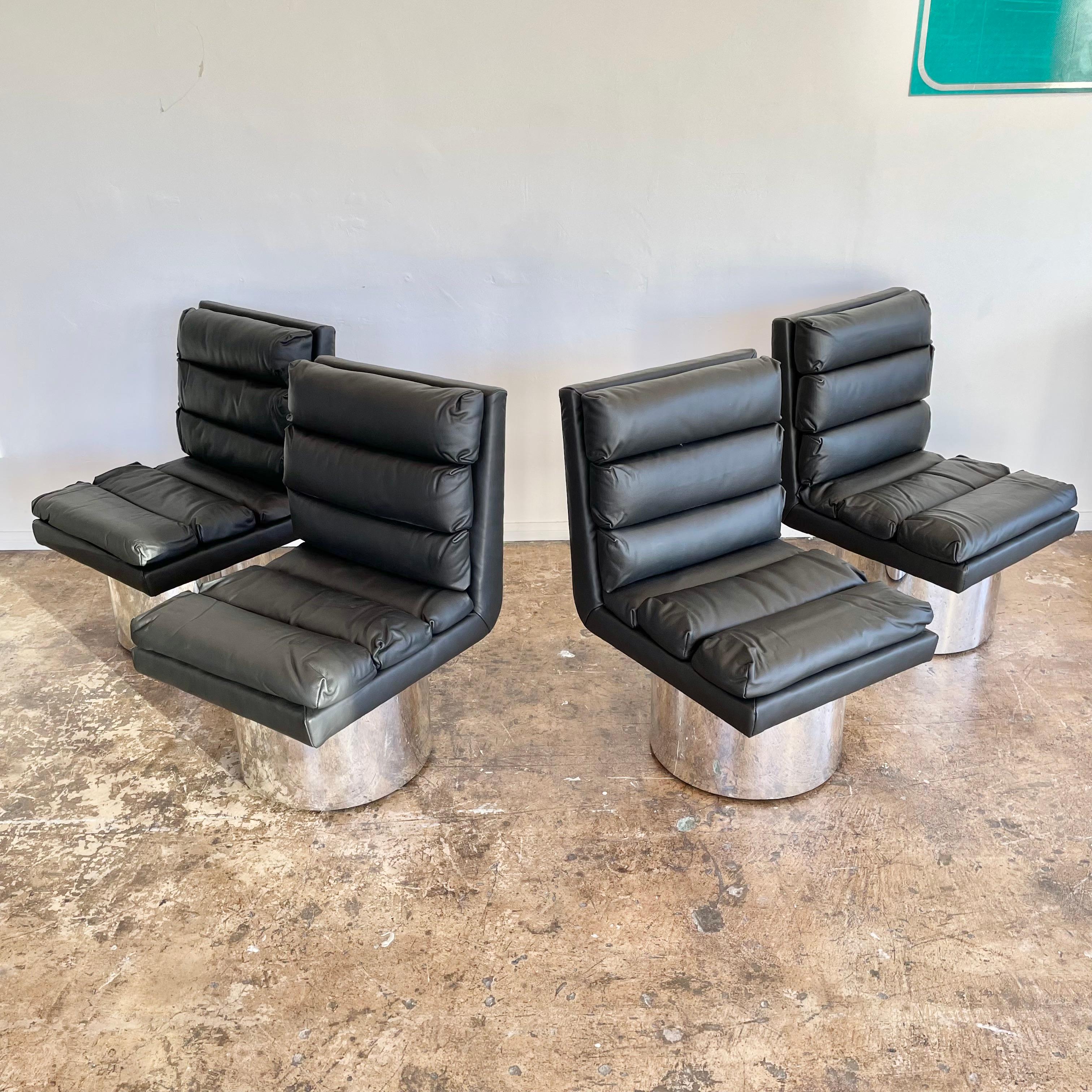 Set of four modern leather and chrome dining chairs redone in a thick and supple leather. Chrome base in good condition with some wear as shown. Extremely comfortable. Priced as a set of 4. 
  